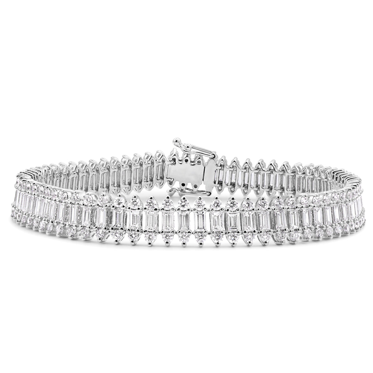 14K gold bracelet featuring 75 baguette diamonds totaling 3.51 CTW and 150 round diamonds totaling 2.72 CTW, for a total diamond weight of 6.23 carats.