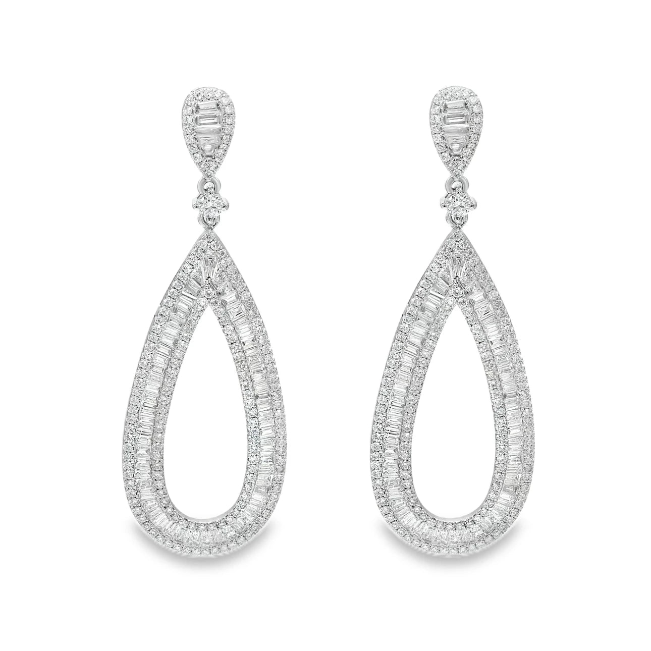 18K white gold baguette and round diamond statement earrings featuring a teardrop design with mixed-cut diamonds for an elegant look.