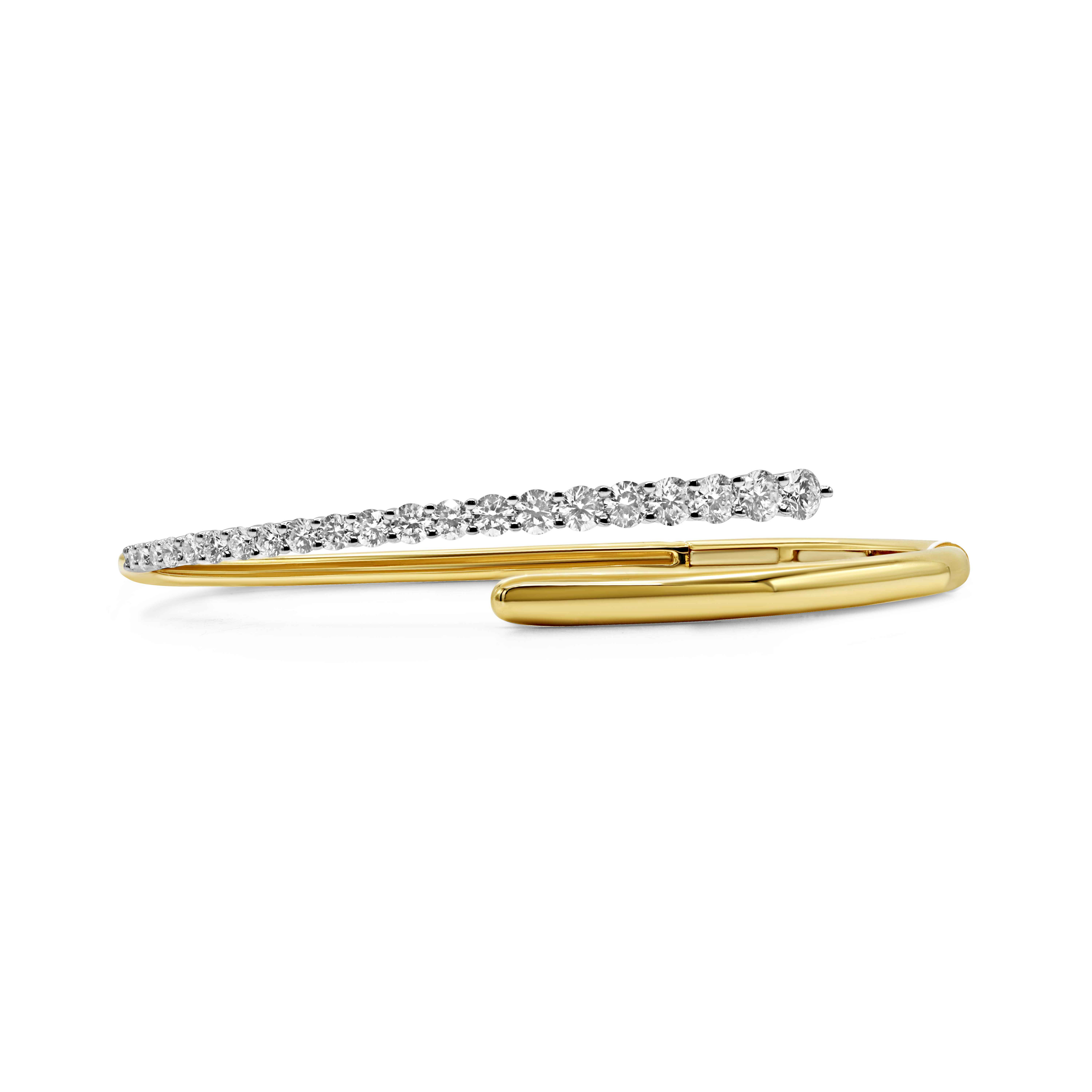 18K yellow gold diamond bangle featuring prong-set round brilliant diamonds in a slim, modern wrap design.