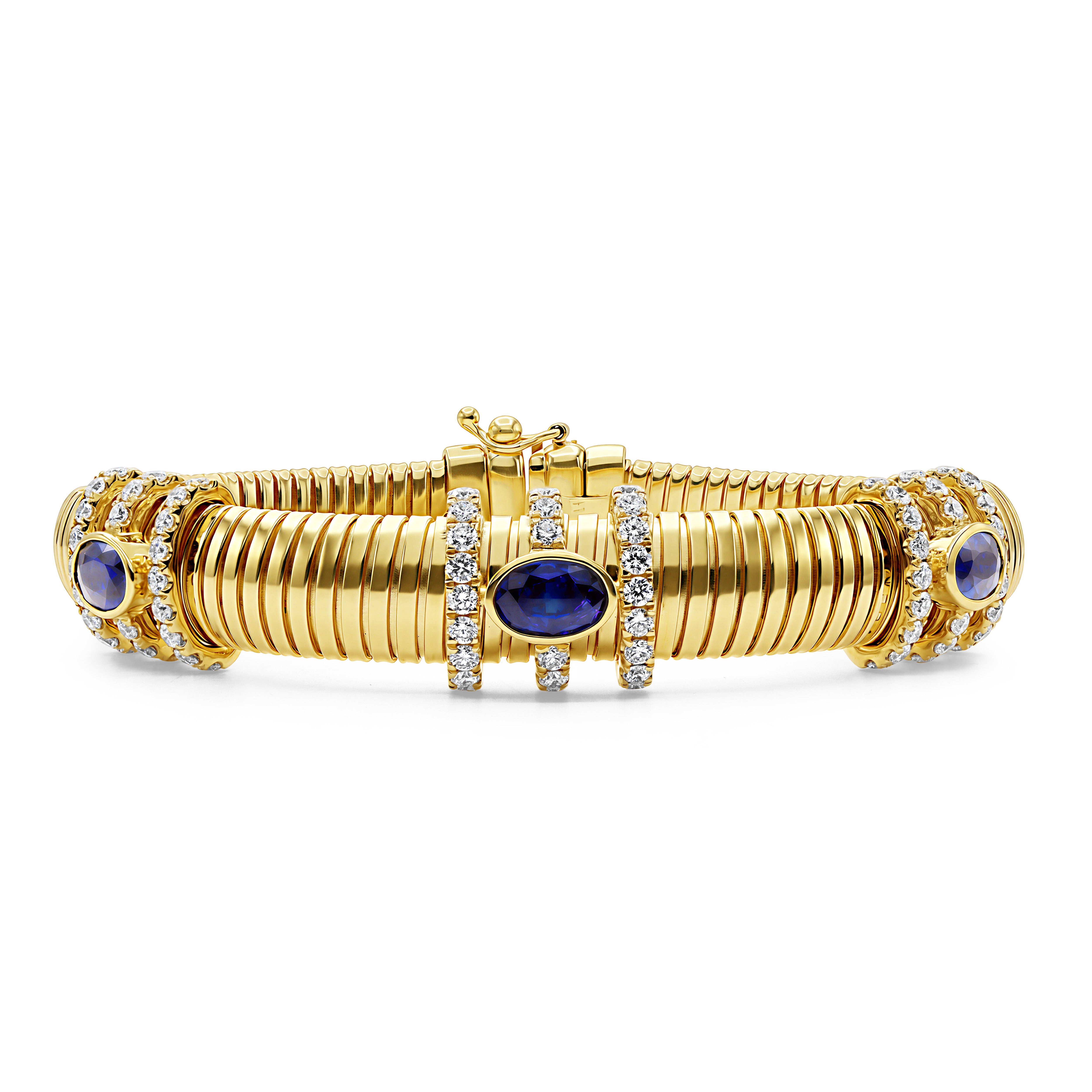 The Sapphire Bezel and Chunky Gold Bracelet