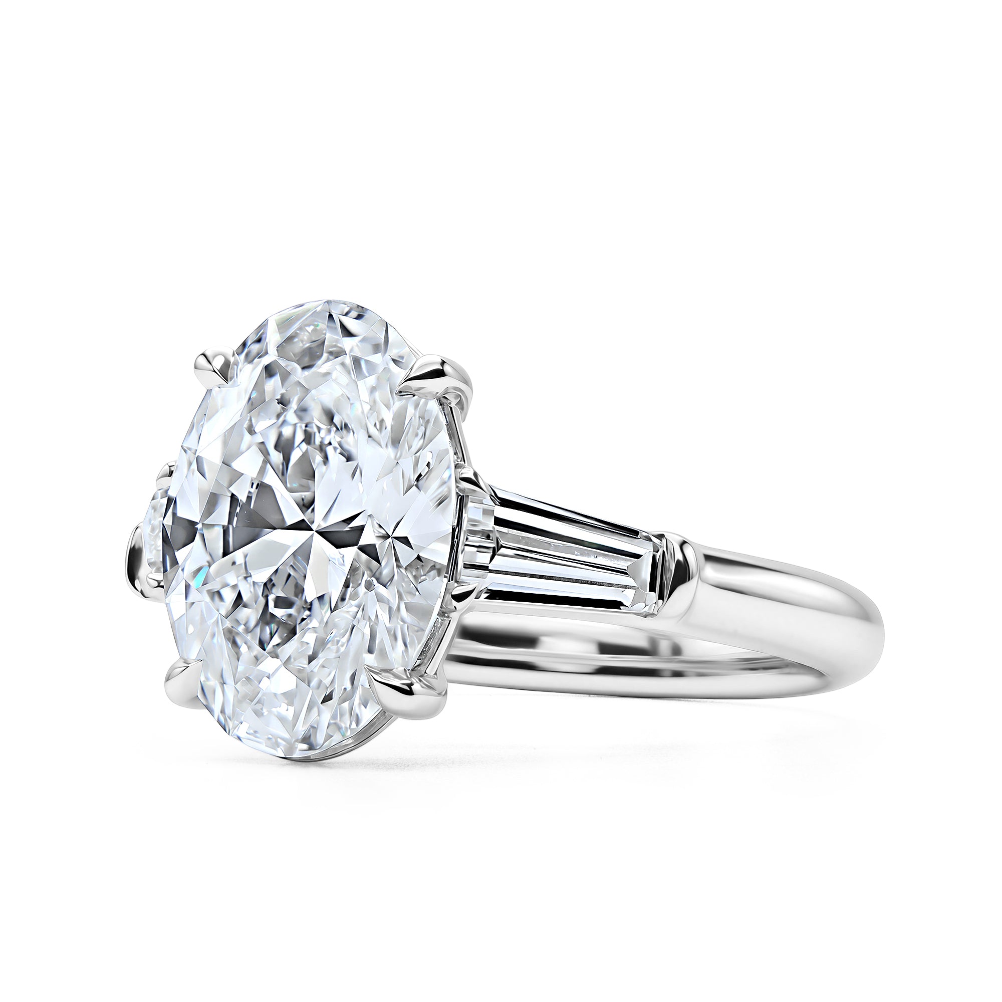 Three-Stone Oval and Baguette Diamond Ring