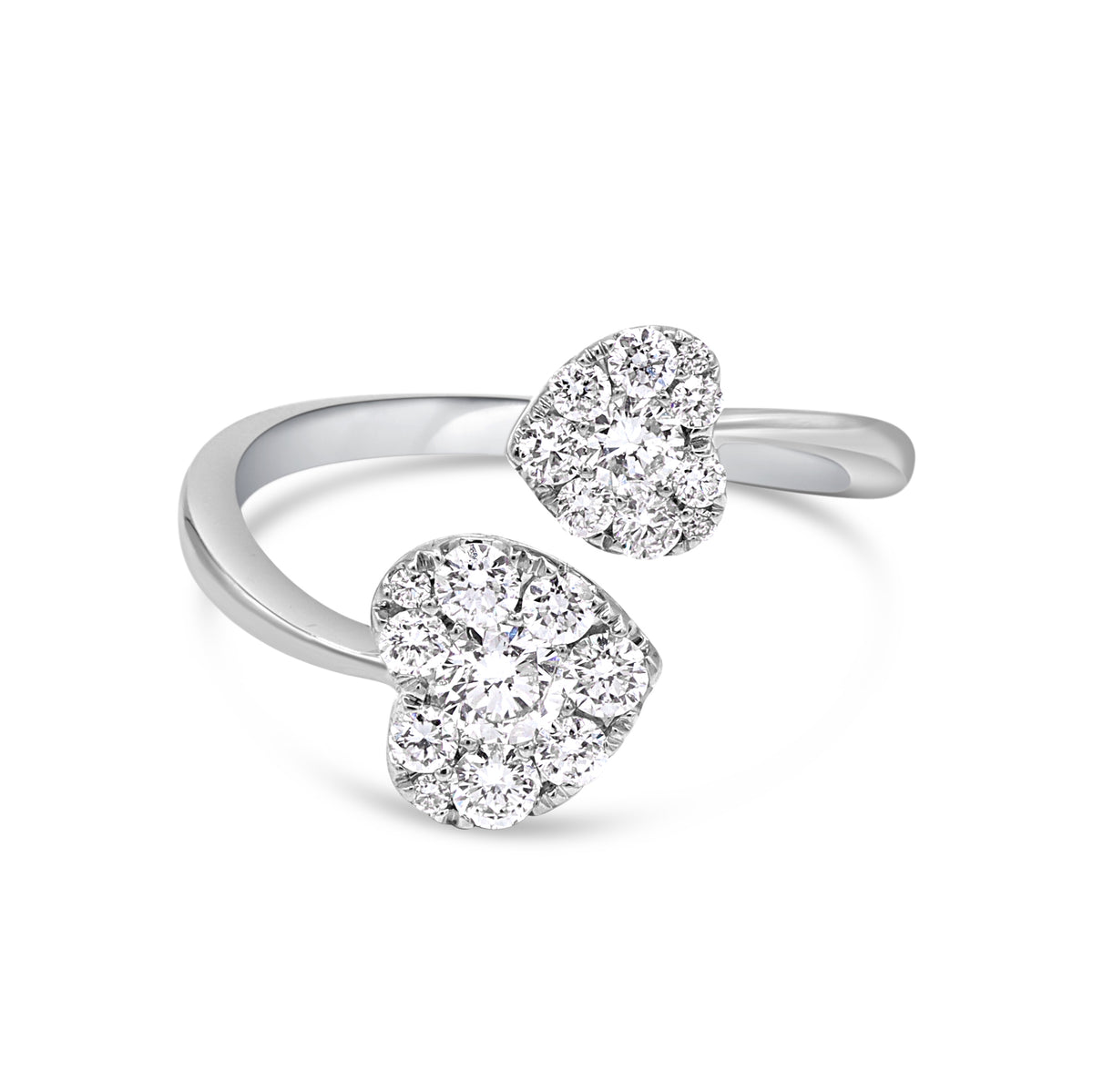 A white gold ring with two heart-shaped main stones, surrounded by smaller round stones.