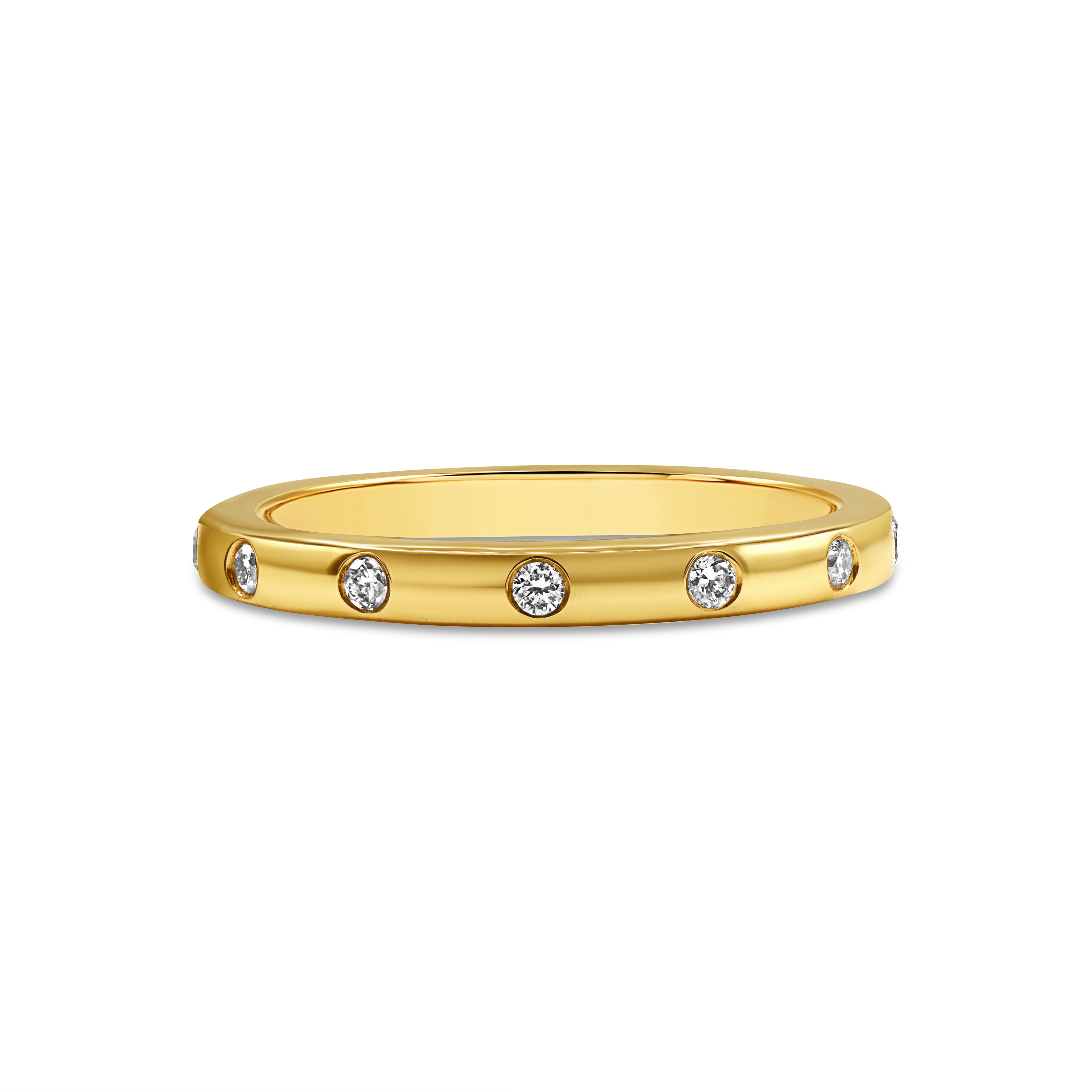 Gold ring with small diamonds on a white background