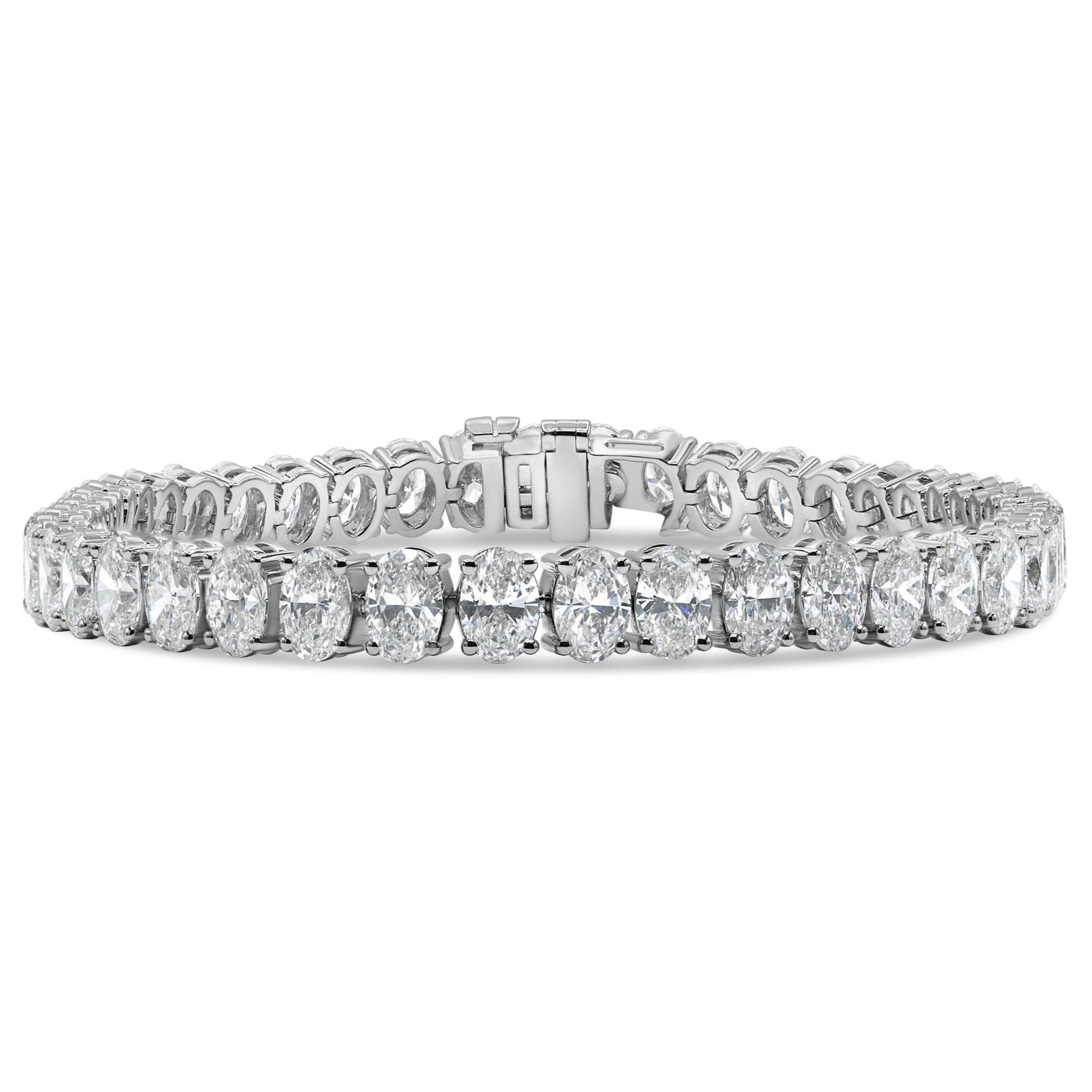 Lab grown oval cut diamond tennis bracelet in 14K white gold featuring oval cut diamonds in a classic, elegant design.