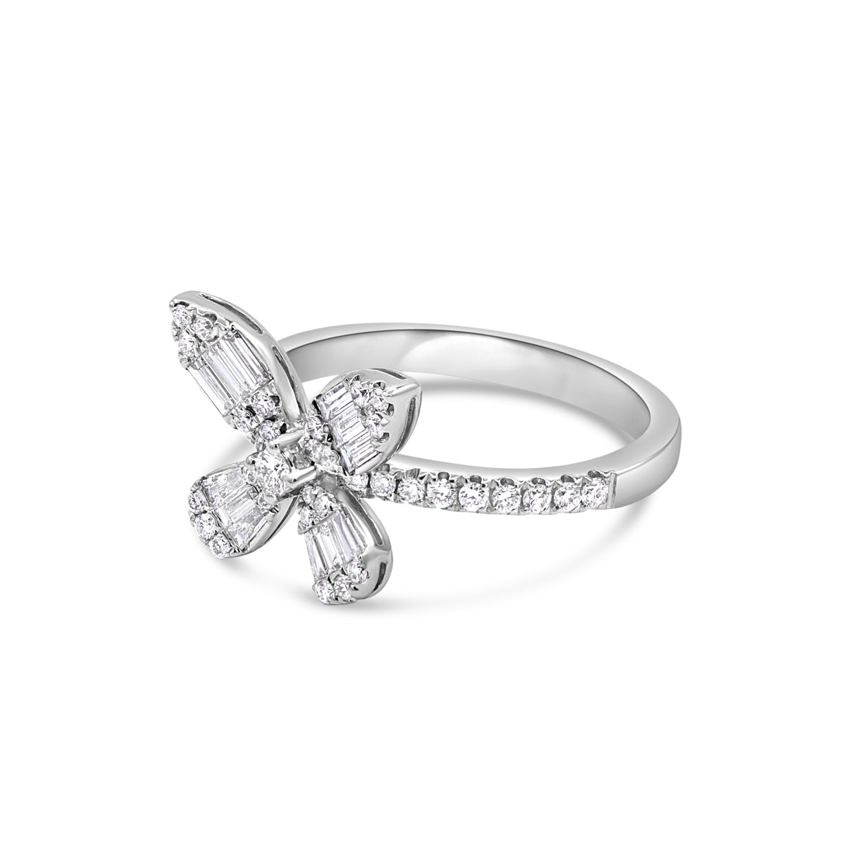 A white gold ring designed in the shape of a butterfly, with round and baguette cut diamonds covering the top.