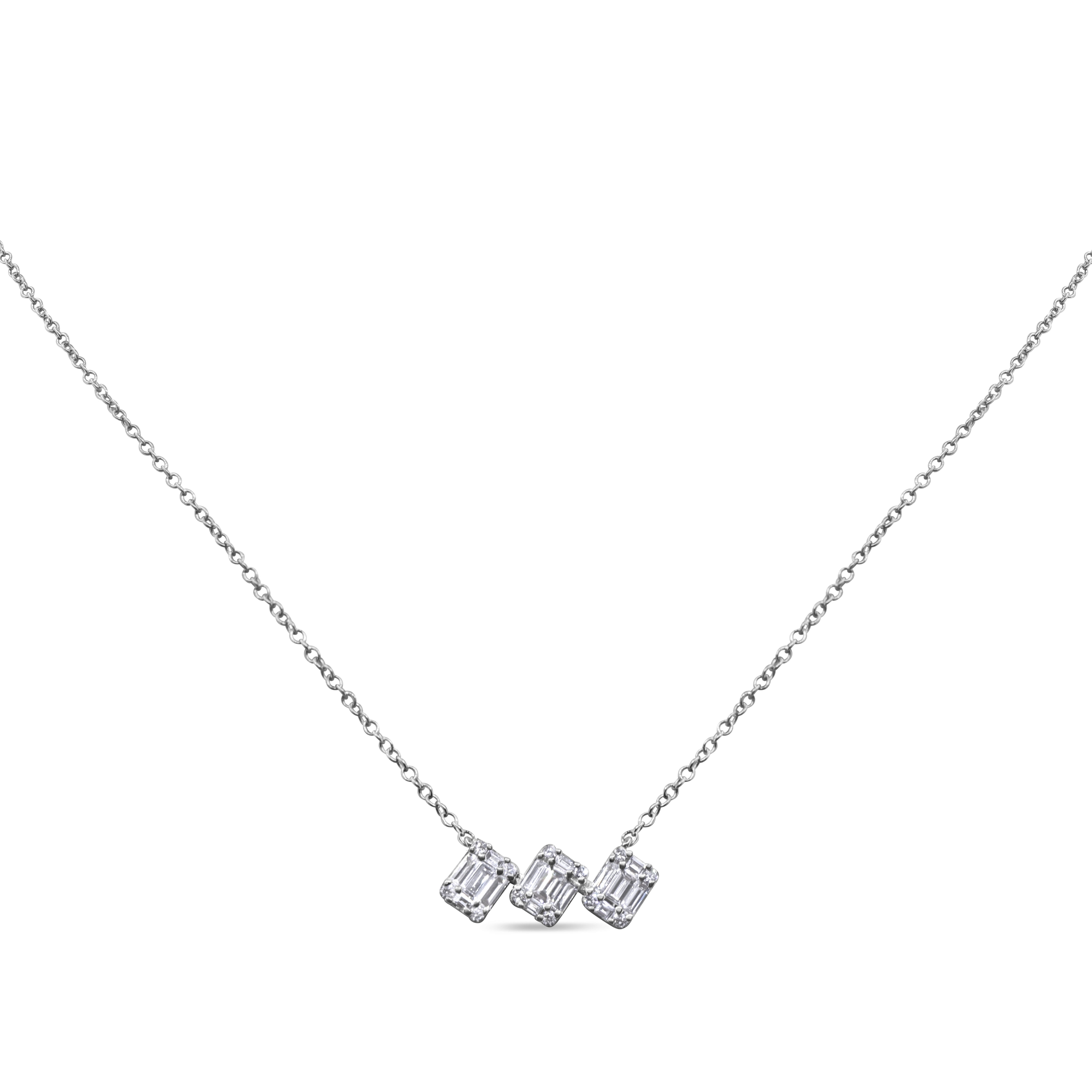 Baguette and round diamond three stone pendant in 14K gold featuring a horizontal prong-set design with a modern, minimal style.