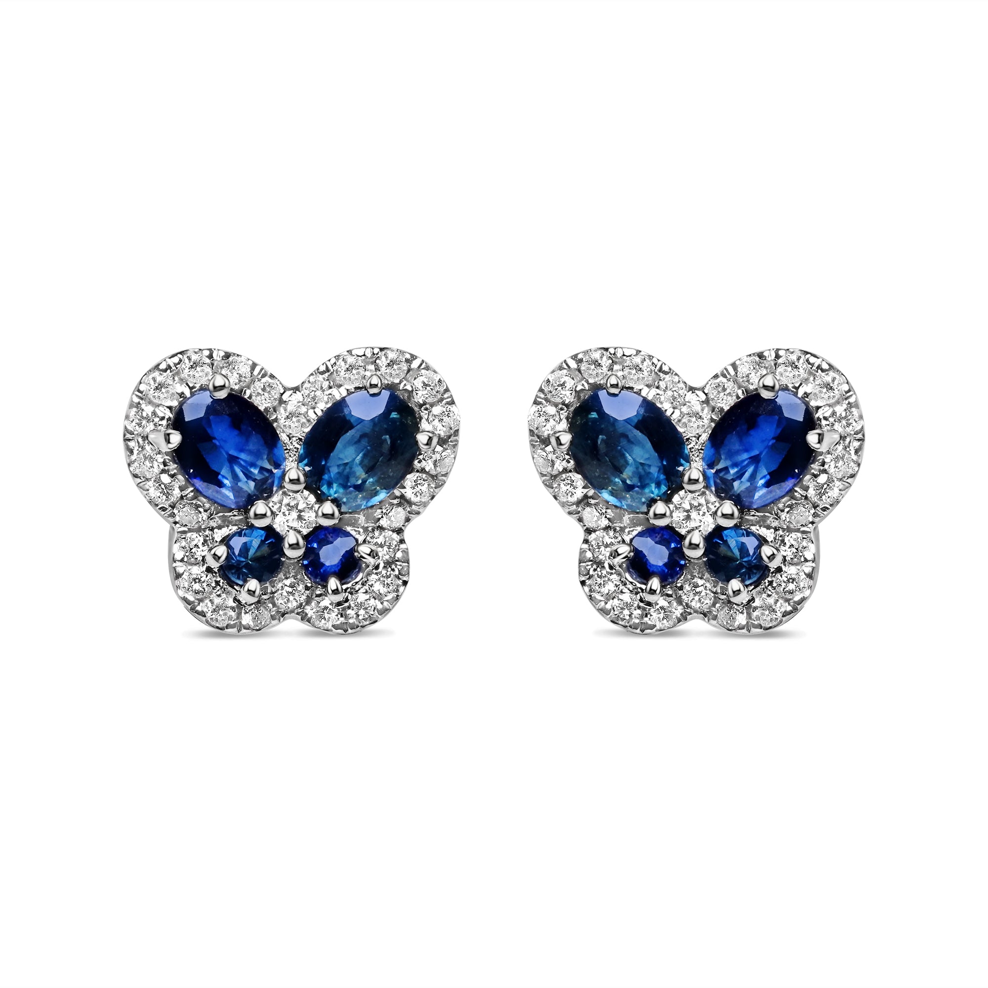 14K white gold butterfly stud earrings featuring vibrant blue sapphires and sparkling round diamond accents.