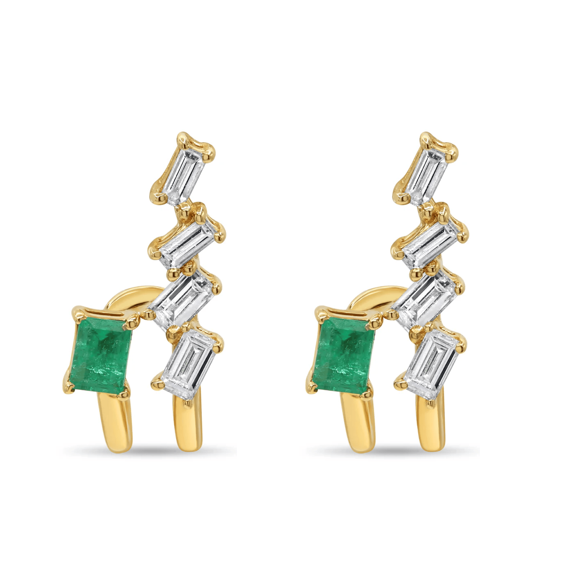 Floating baguette and green emerald earrings in 14K gold featuring staggered diamond clusters with bezel-set emerald accents.