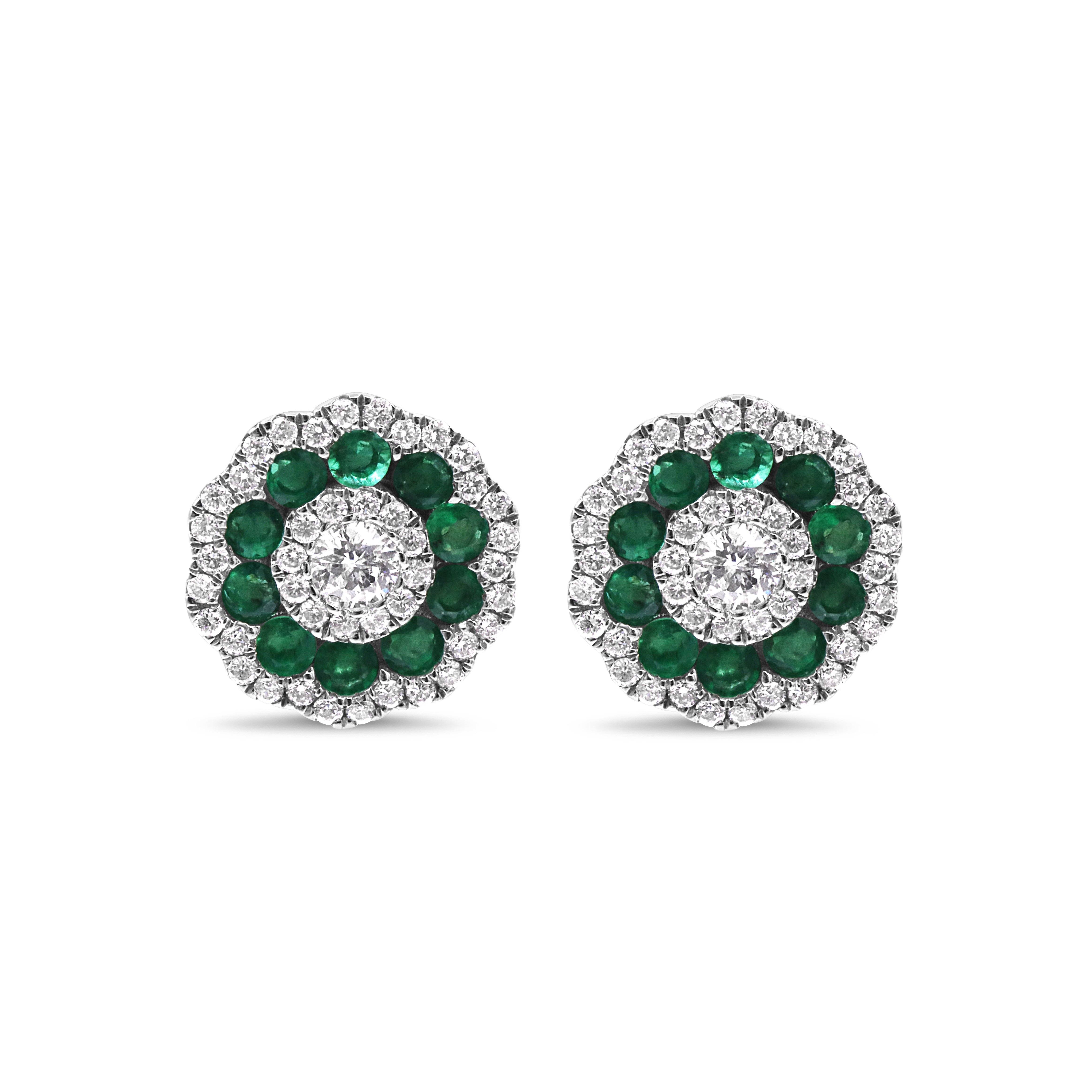 18K white gold stud earrings featuring green emeralds and round diamonds in a colorful cluster setting.