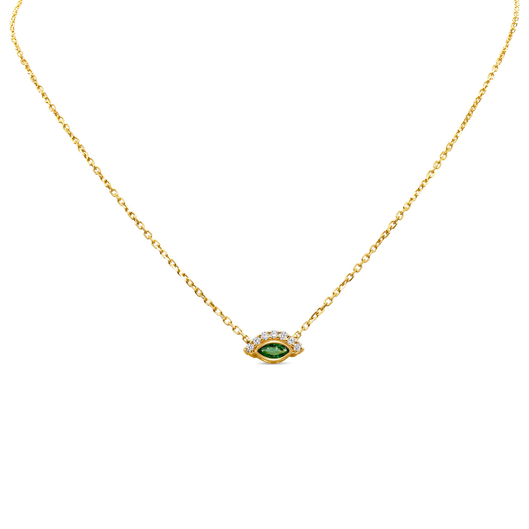 Green eye pendant in 14K gold featuring an emerald center with round diamond accents in a chic, modern design.