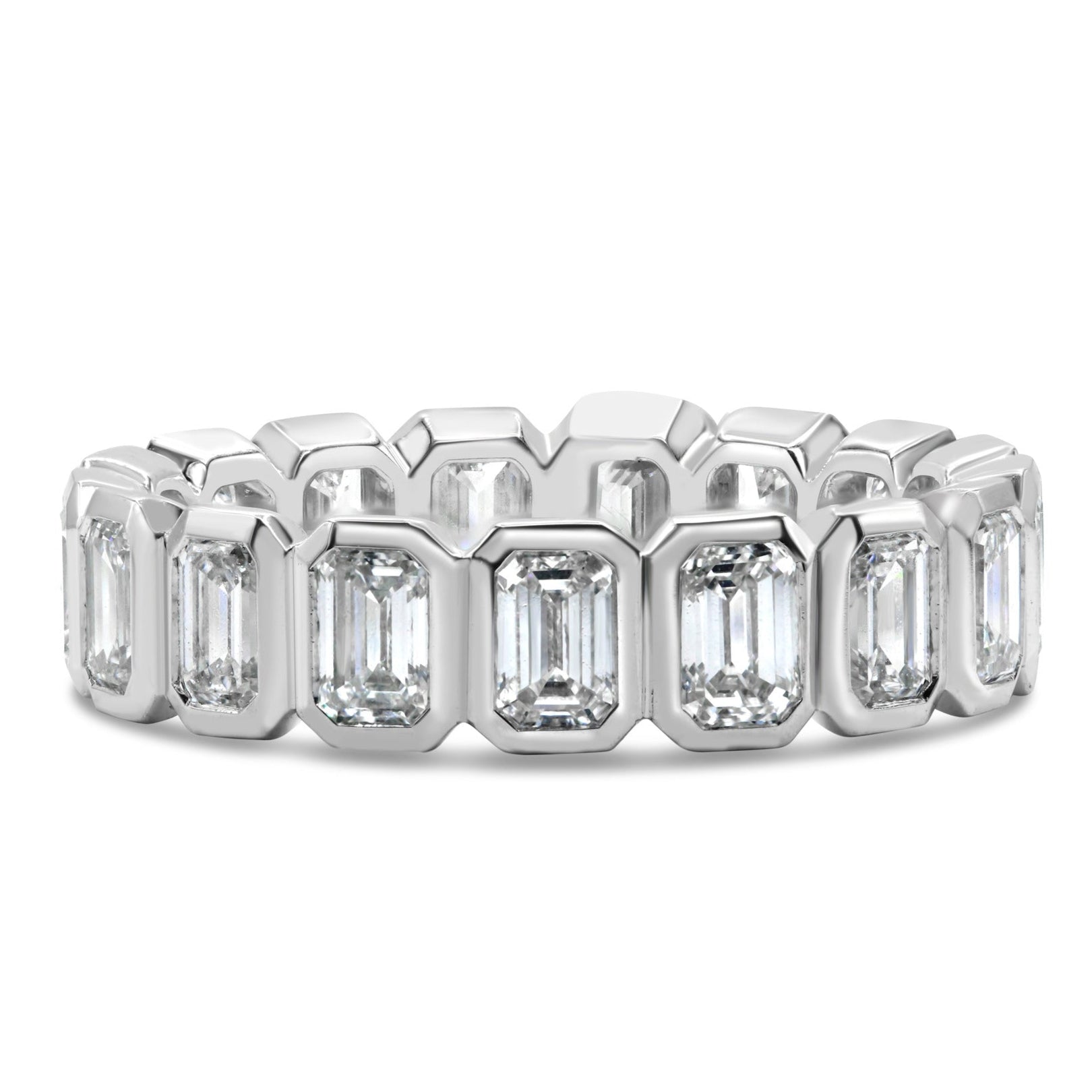 Lab grown bezel emerald cut diamond eternity band in 14K white gold featuring emerald cut diamonds in a modern bezel-set design.