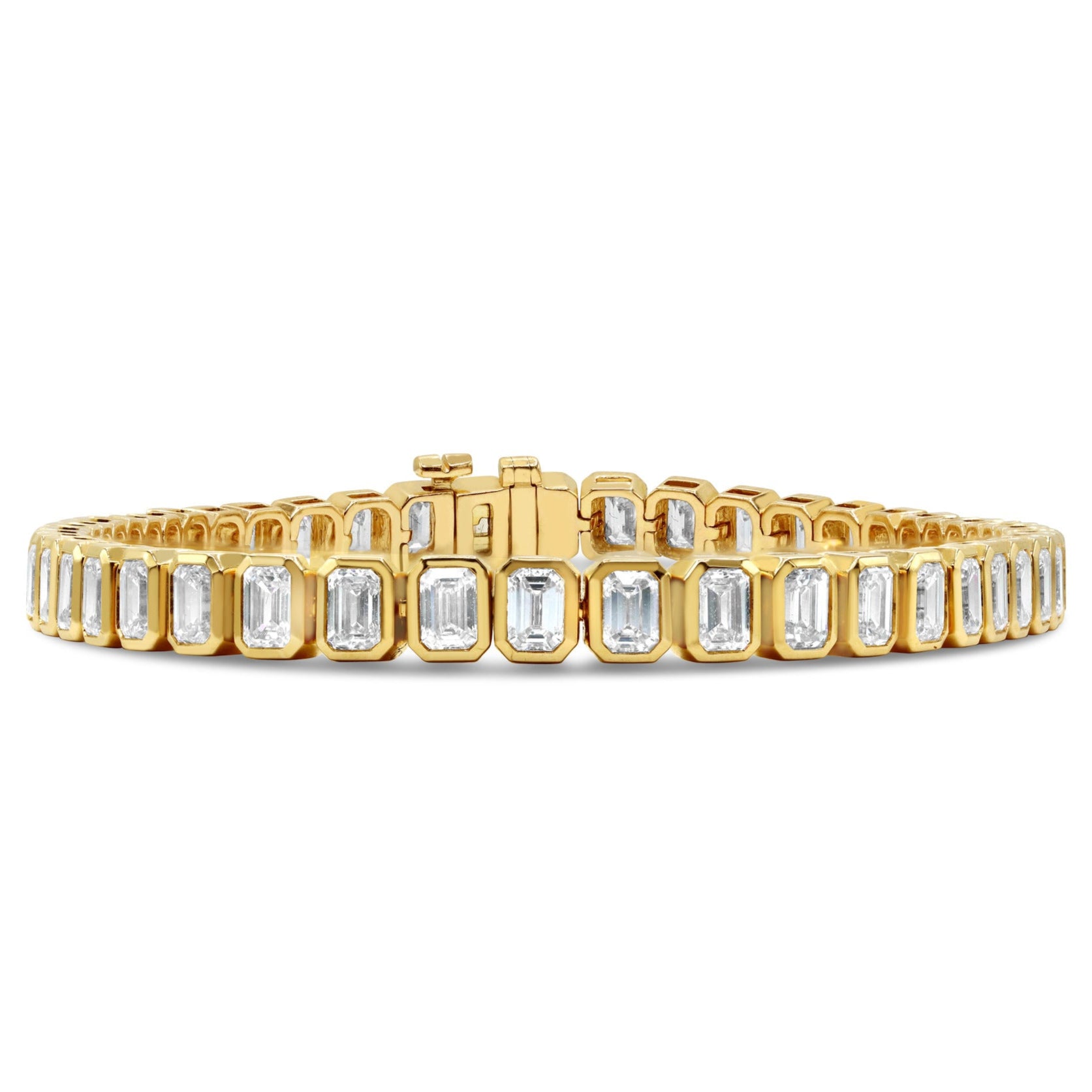Lab grown bezel emerald cut diamond tennis bracelet in 14K gold featuring emerald cut diamonds in a sleek bezel-set design.