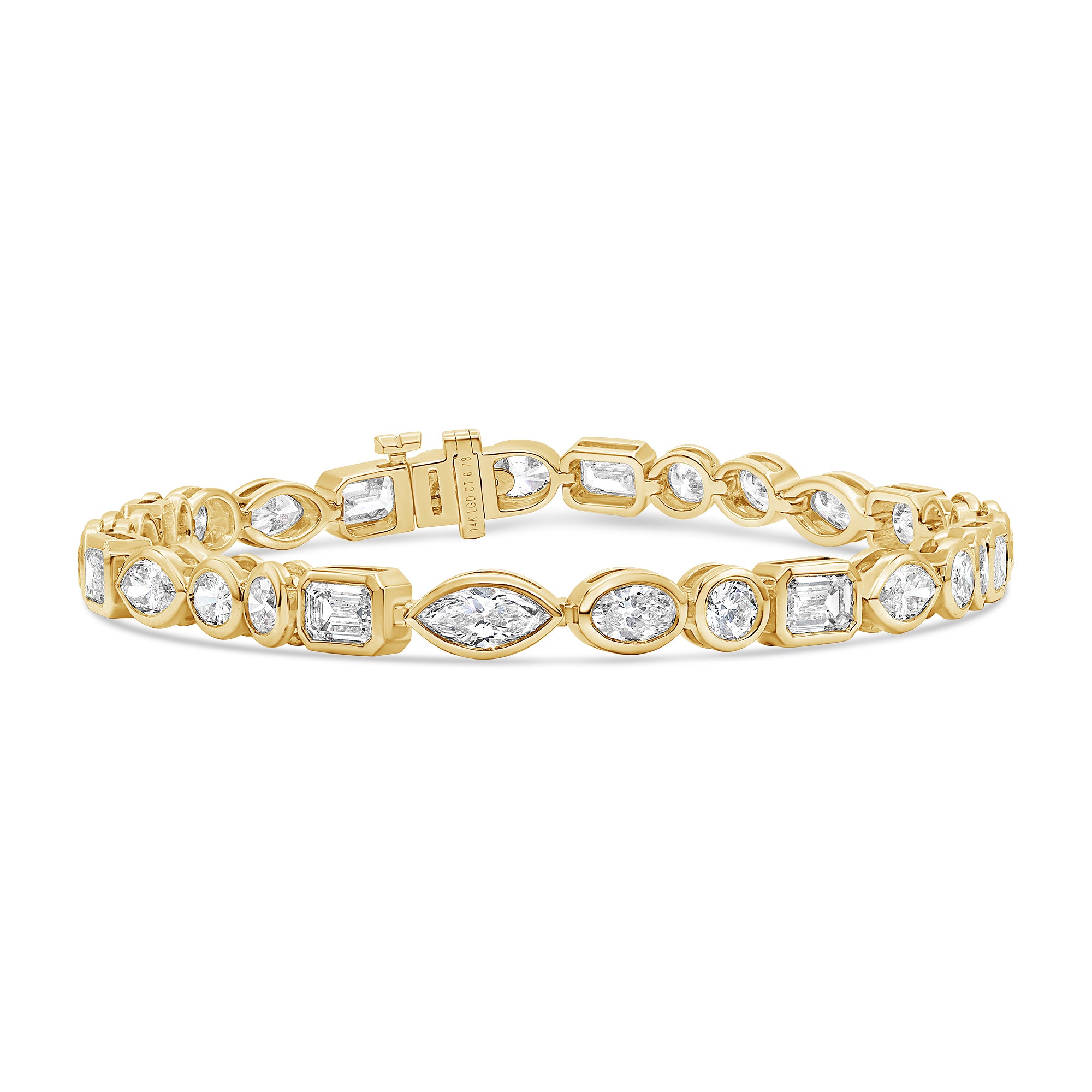 Lab grown emerald and round diamond bracelet in 14K yellow gold featuring alternating bezel-set diamonds in a bold, elegant design.
