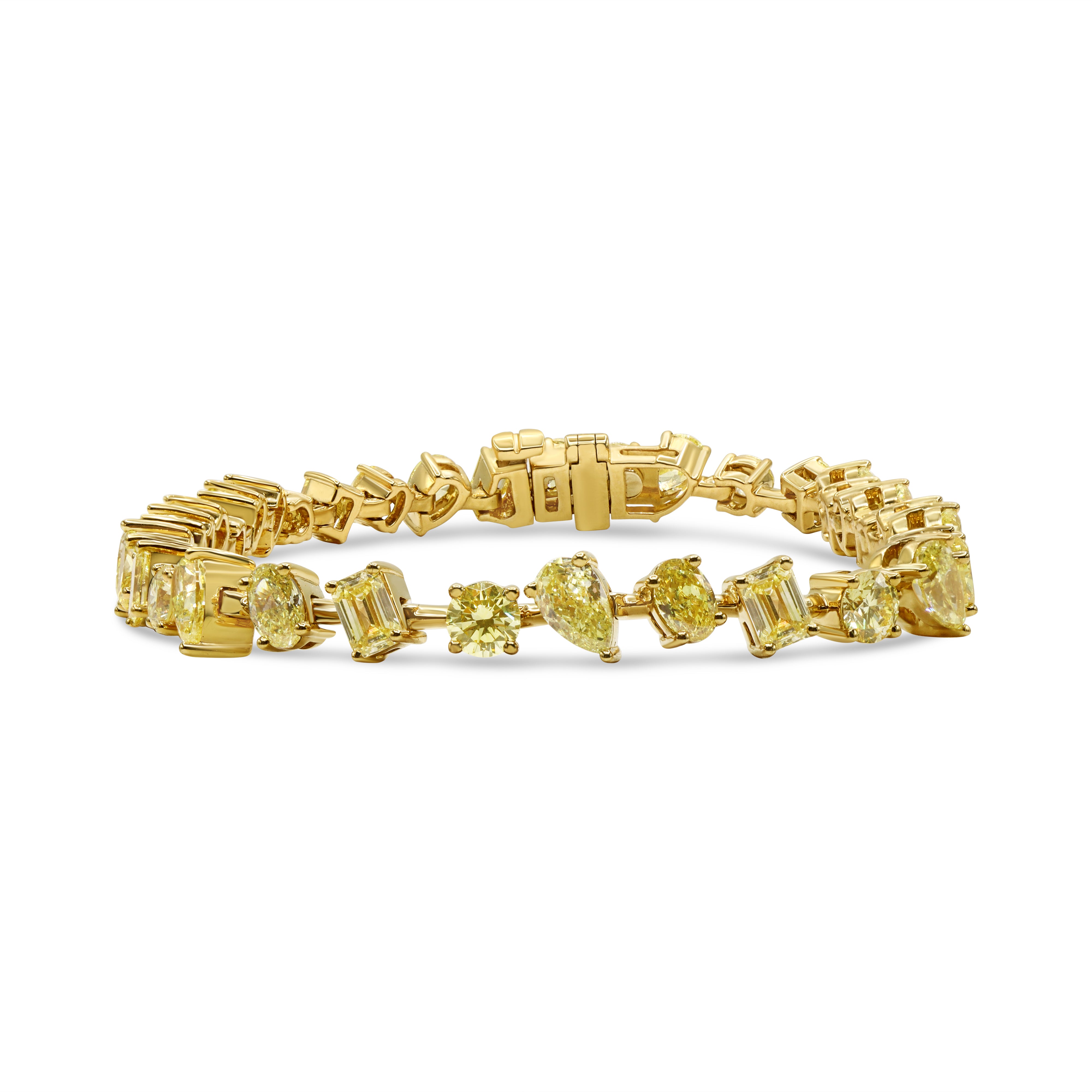 18K yellow gold bracelet featuring alternating fancy yellow pear, emerald, and oval cut diamonds in a luxurious design.