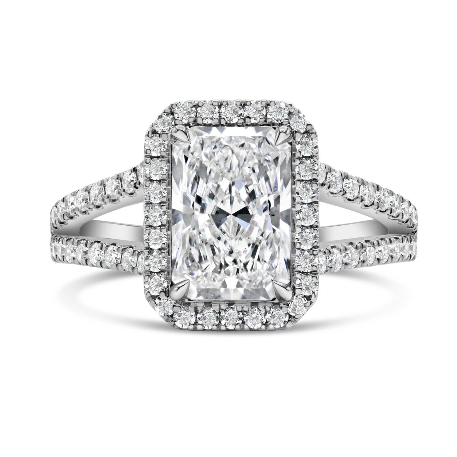 14K white gold halo ring featuring a lab grown radiant cut diamond design with split shank detailing and sparkling diamond accents.