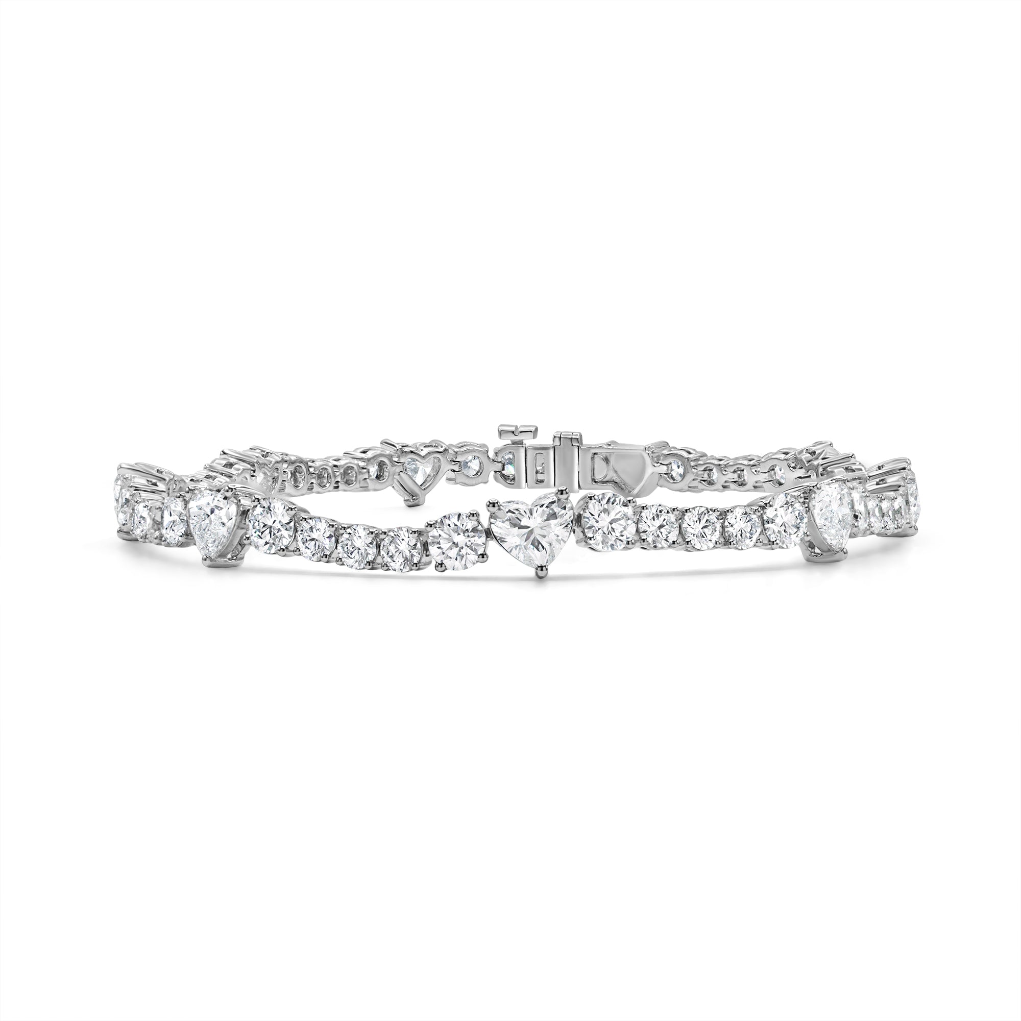 14K gold bracelet featuring alternating round and heart-shaped diamonds in a romantic prong-set design.