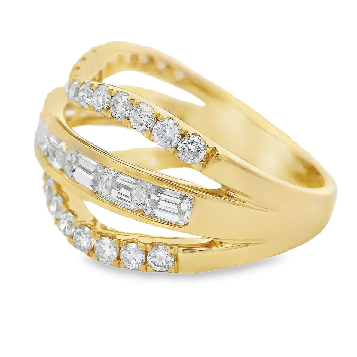 18K yellow gold wave ring with emerald and round cut diamond accents in a fluid design.