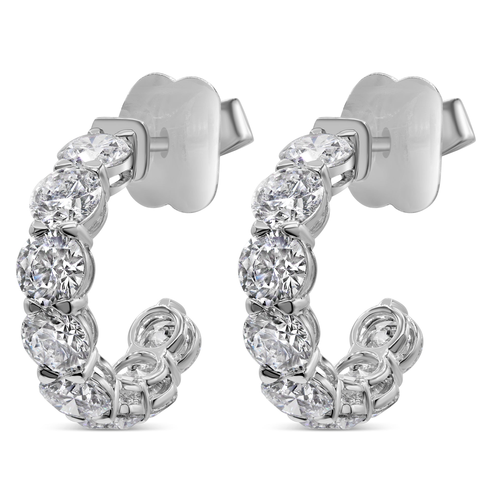 Lab grown round diamond huggie earrings featuring round cut diamonds with VS1-VS2 clarity in a classic, elegant design.