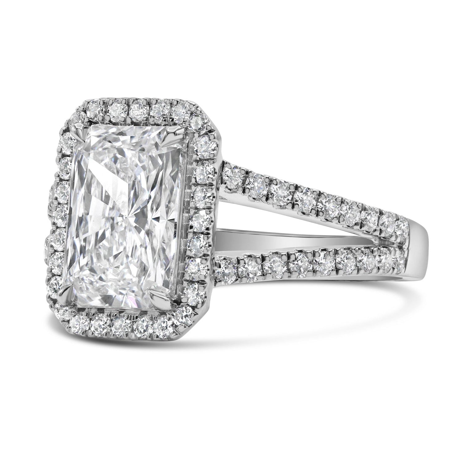 Radiant cut split shank halo diamond ring in 14K white gold featuring lab grown radiant cut diamonds with a sparkling halo design.