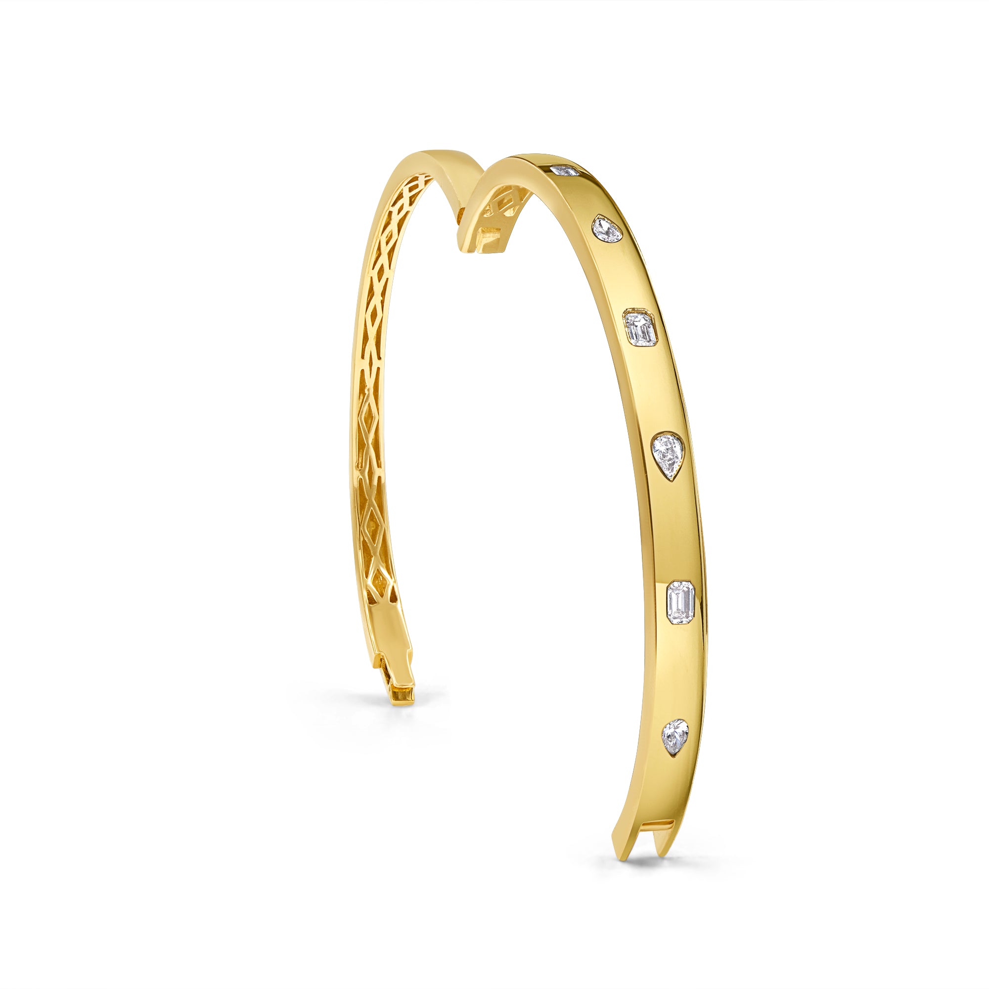 Emerald and pear diamond inlay bangle in 14K gold featuring prong-set emeralds and pear-shaped diamonds in an elegant, modern design.