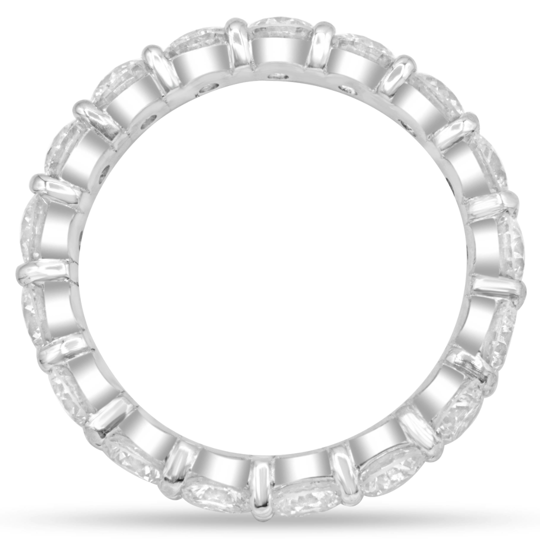 Platinum diamond eternity band featuring 17 brilliant round diamonds totaling 2.58 carats.