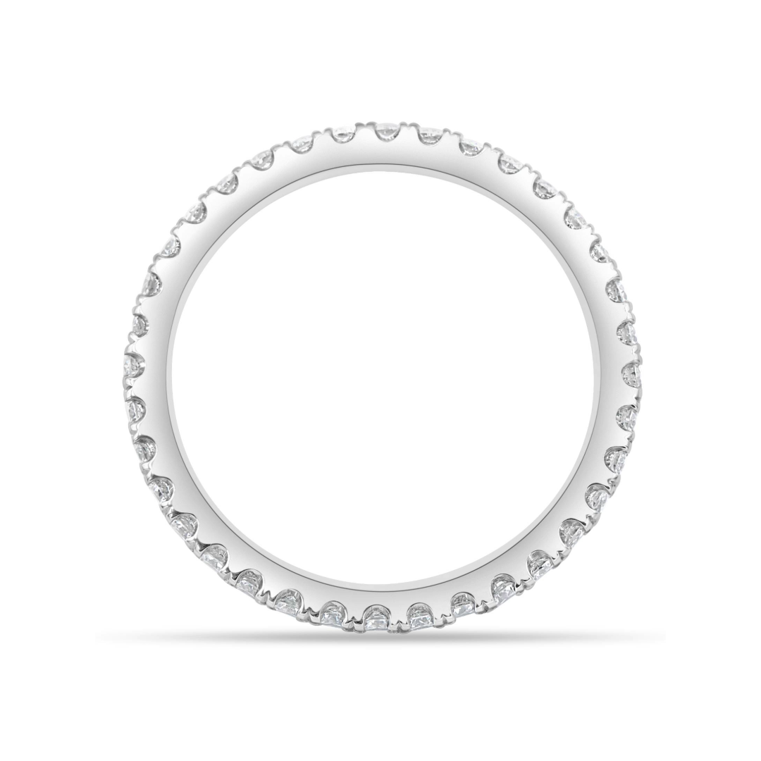 Platinum micro pavé diamond wedding band with 36 brilliant round diamonds totaling 0.61 carats.