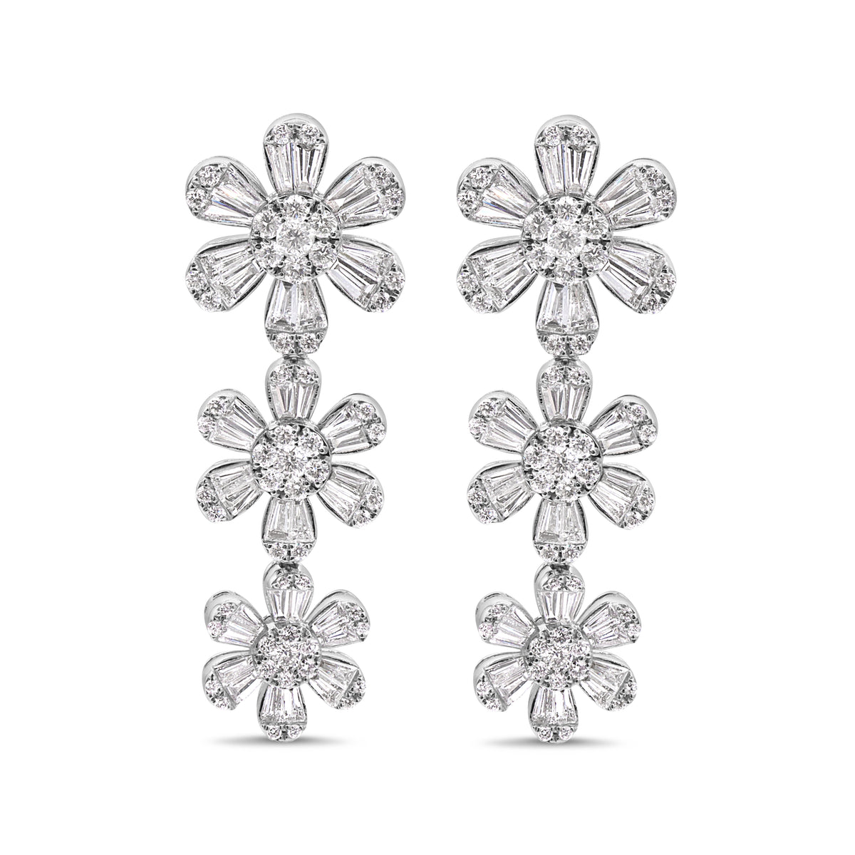 14K gold three flower drop earrings featuring 72 baguette diamonds totaling 2.06 CTW and 114 round diamonds totaling 1.29 CTW.