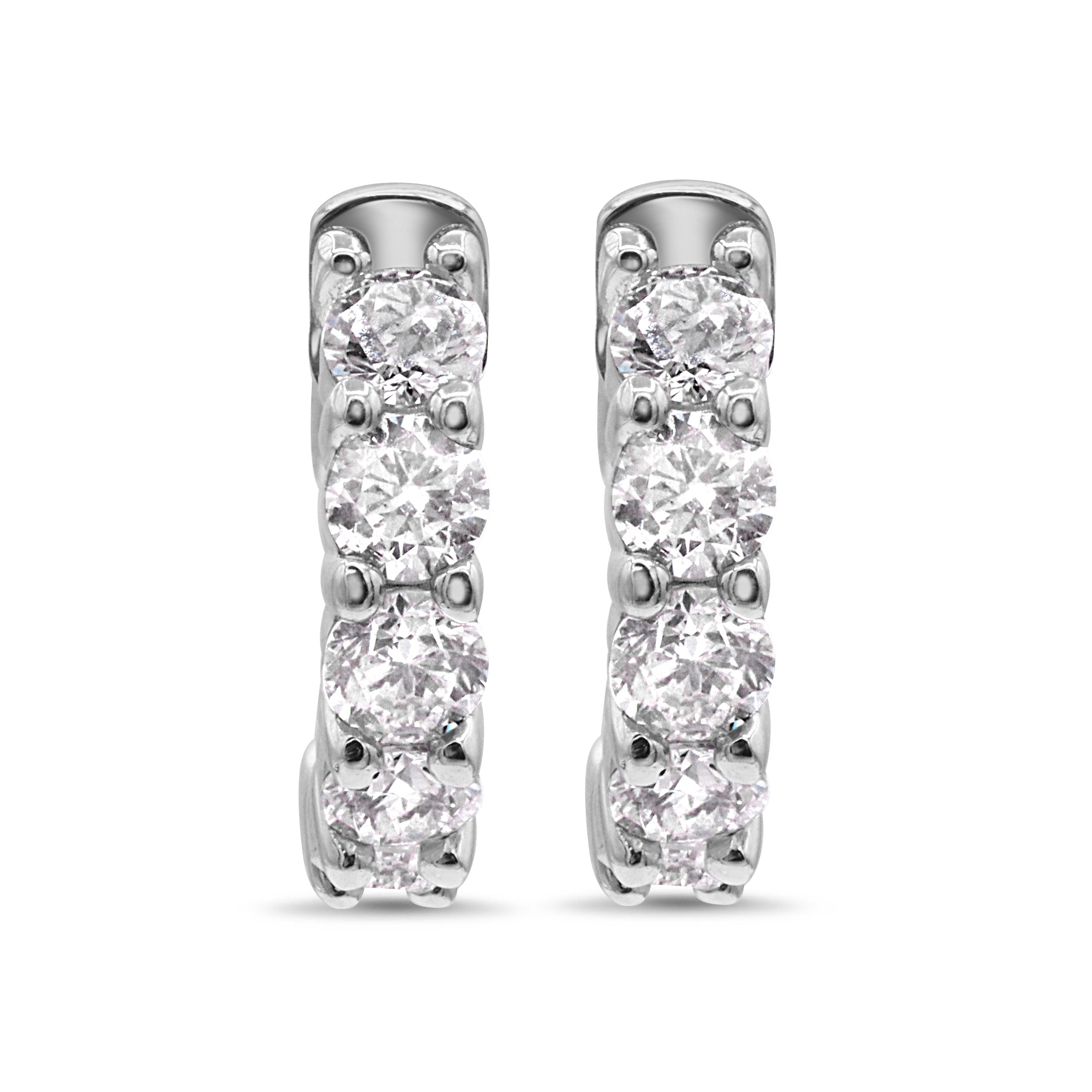 14K white gold huggie earrings featuring 10 round brilliant diamonds with a bold, high-impact design.
