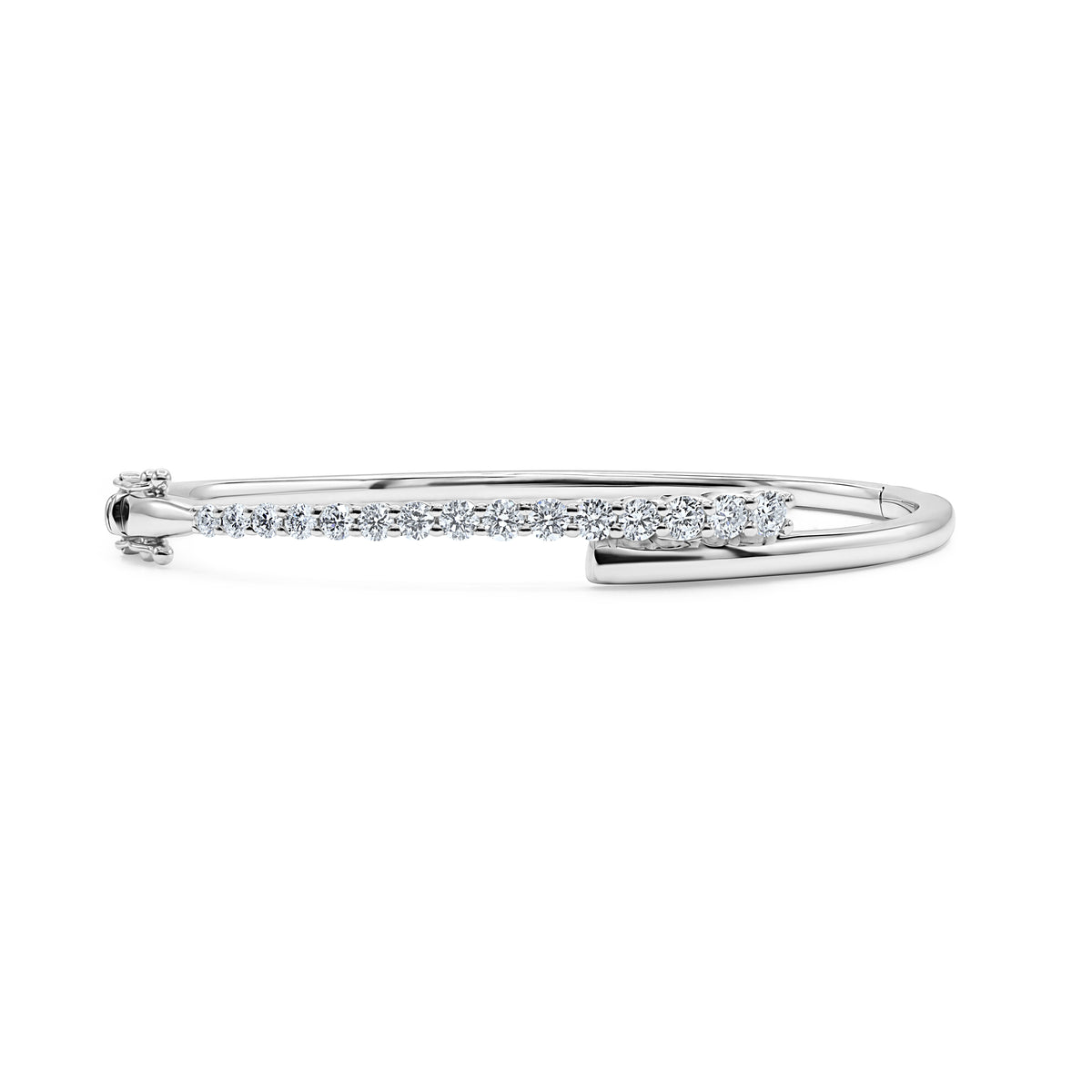 14K white gold diamond bangle featuring 15 prong-set round diamonds totaling 1.04 CTW.