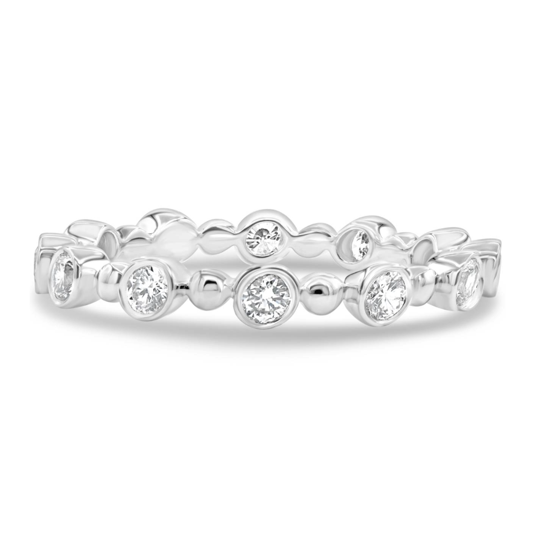 18K gold bezel and bead eternity band featuring 12 round brilliant diamonds totaling 4.08 CTW in alternating bezel-set and polished bead design.