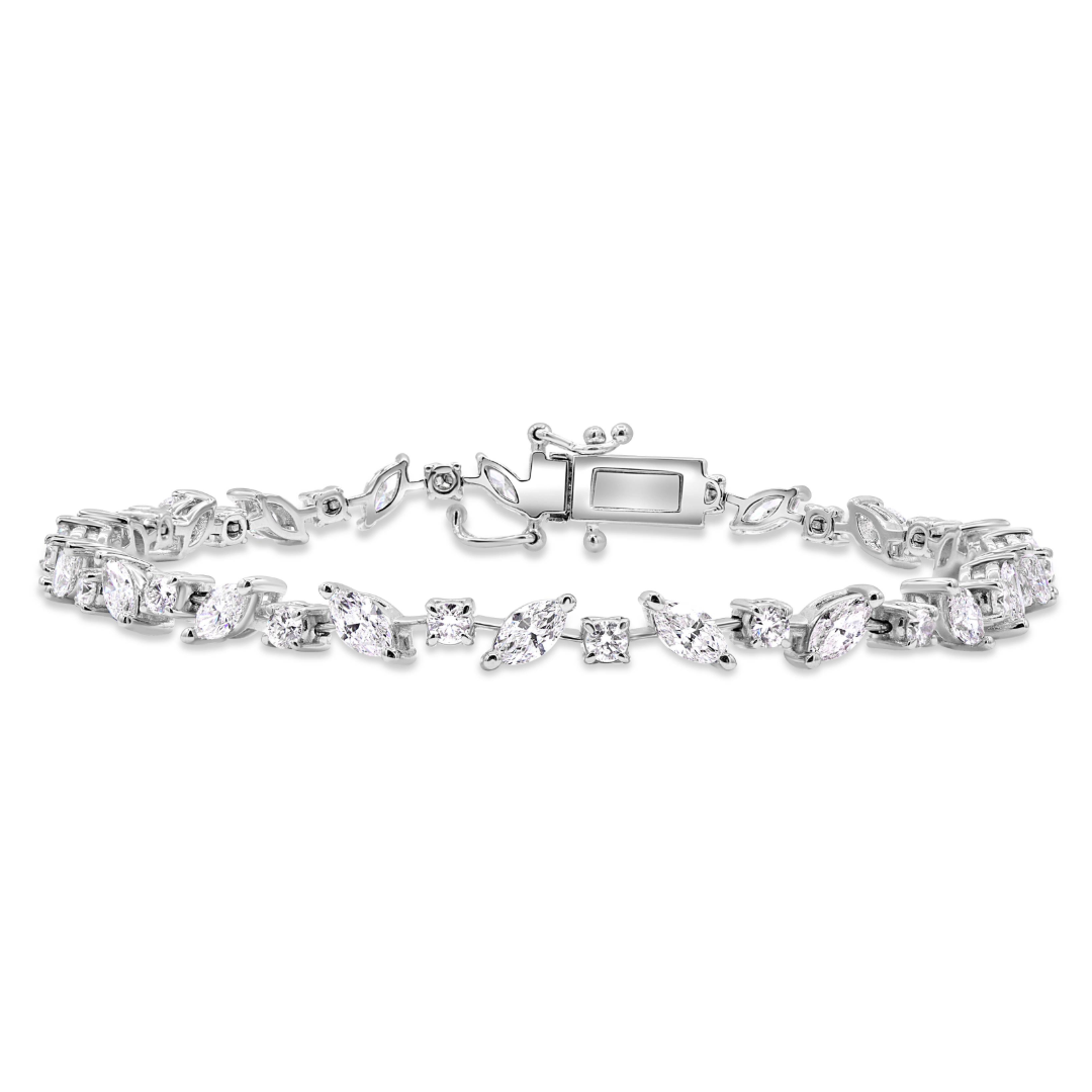 18K gold 7-inch zig-zag bracelet featuring 21 round diamonds totaling 0.92 CTW and 21 marquise diamonds totaling 2.88 CTW.