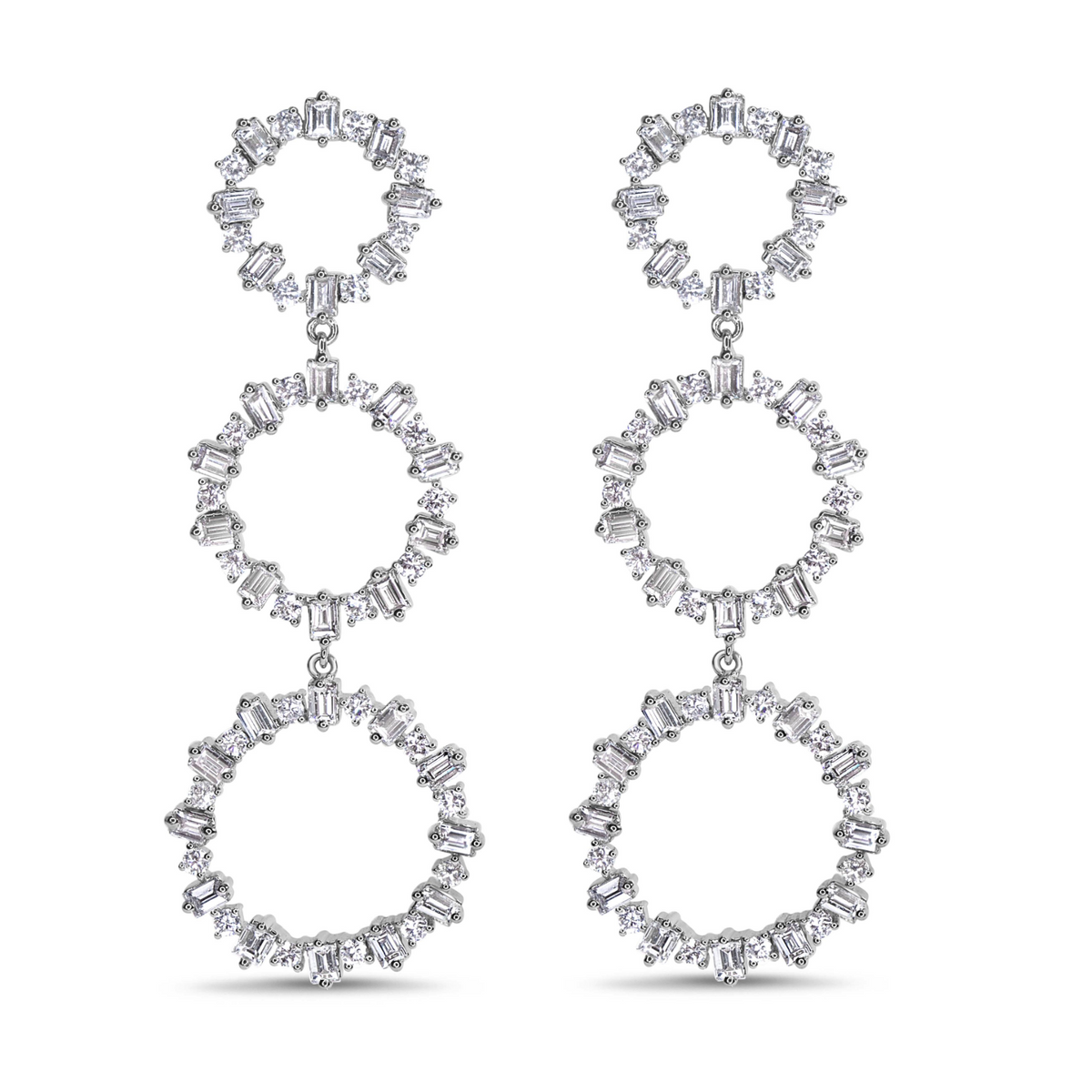 18K white gold three ring drop earrings featuring 4.50 carats of baguette and round diamonds.