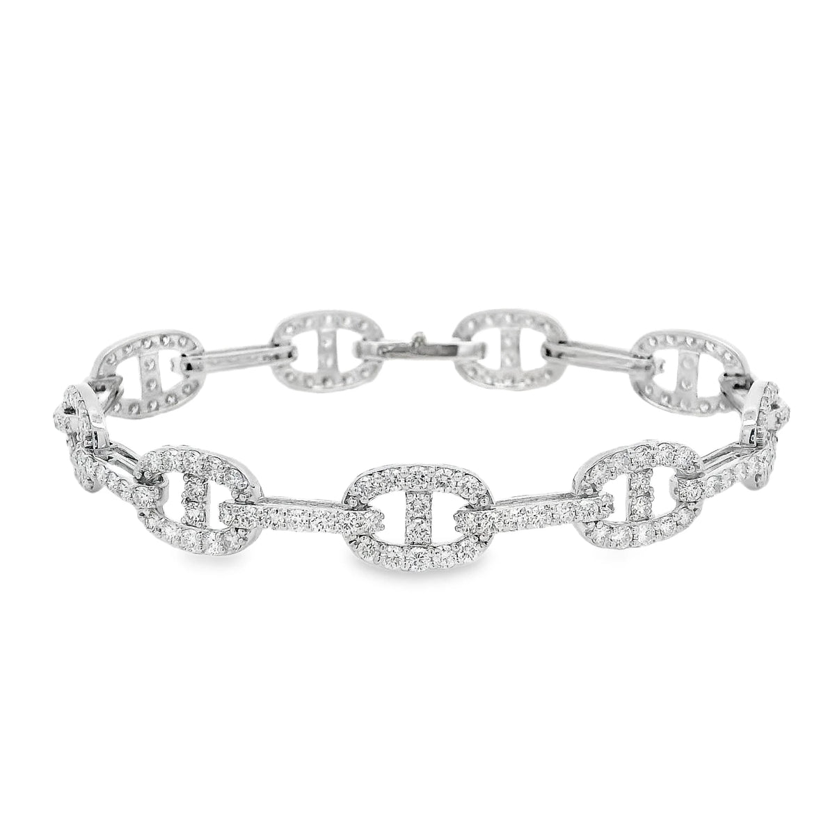 18K yellow or white gold link bracelet featuring 4.91 carats of G-H color VS2-SI1 round diamonds in a sophisticated 9MM design.