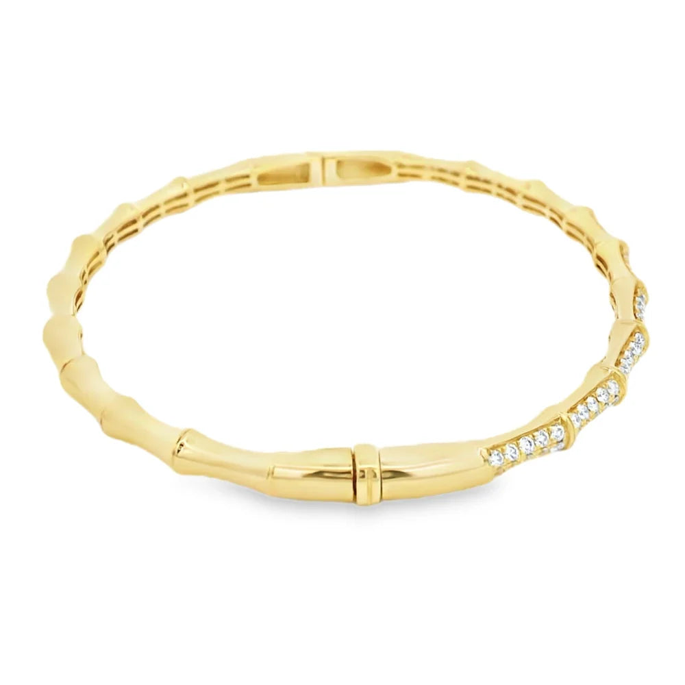 Diamond bamboo bangle bracelet available in 18K yellow, white, or rose gold featuring round diamonds in a bamboo-inspired design.