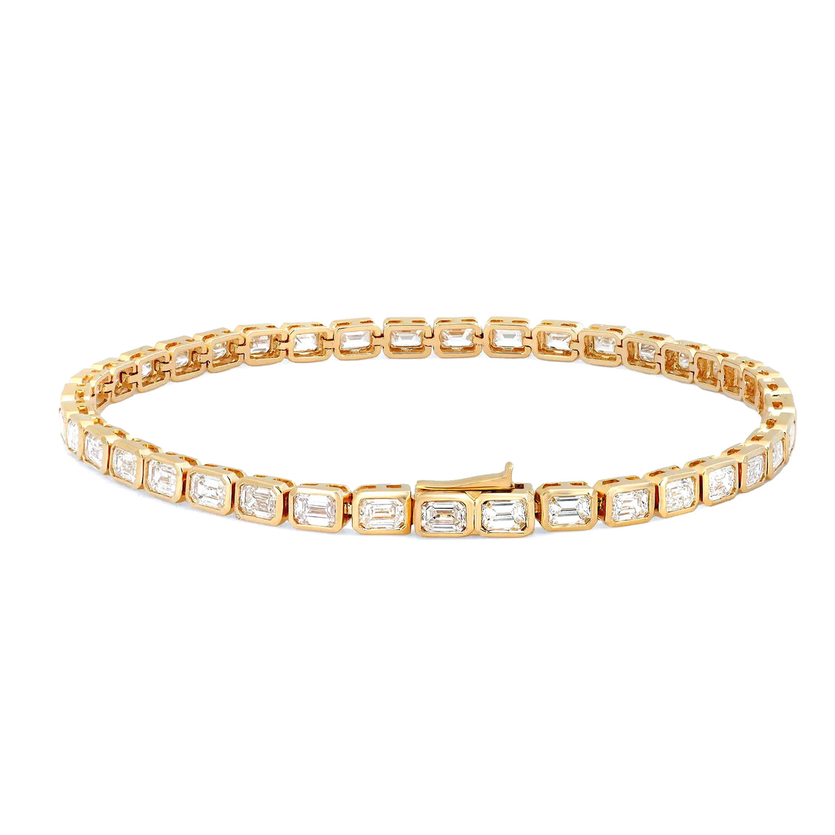 18K yellow gold east-west bracelet with bezel-set emerald cut diamonds totaling 5.71 carats.