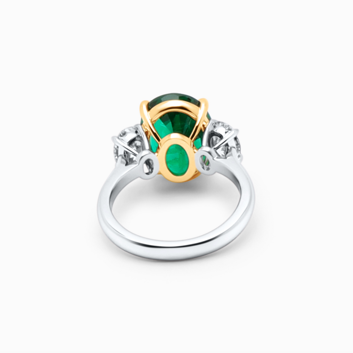 Oval emerald ring with a 4.44 carat emerald and 1.09 carat F-G color VS2 diamond.