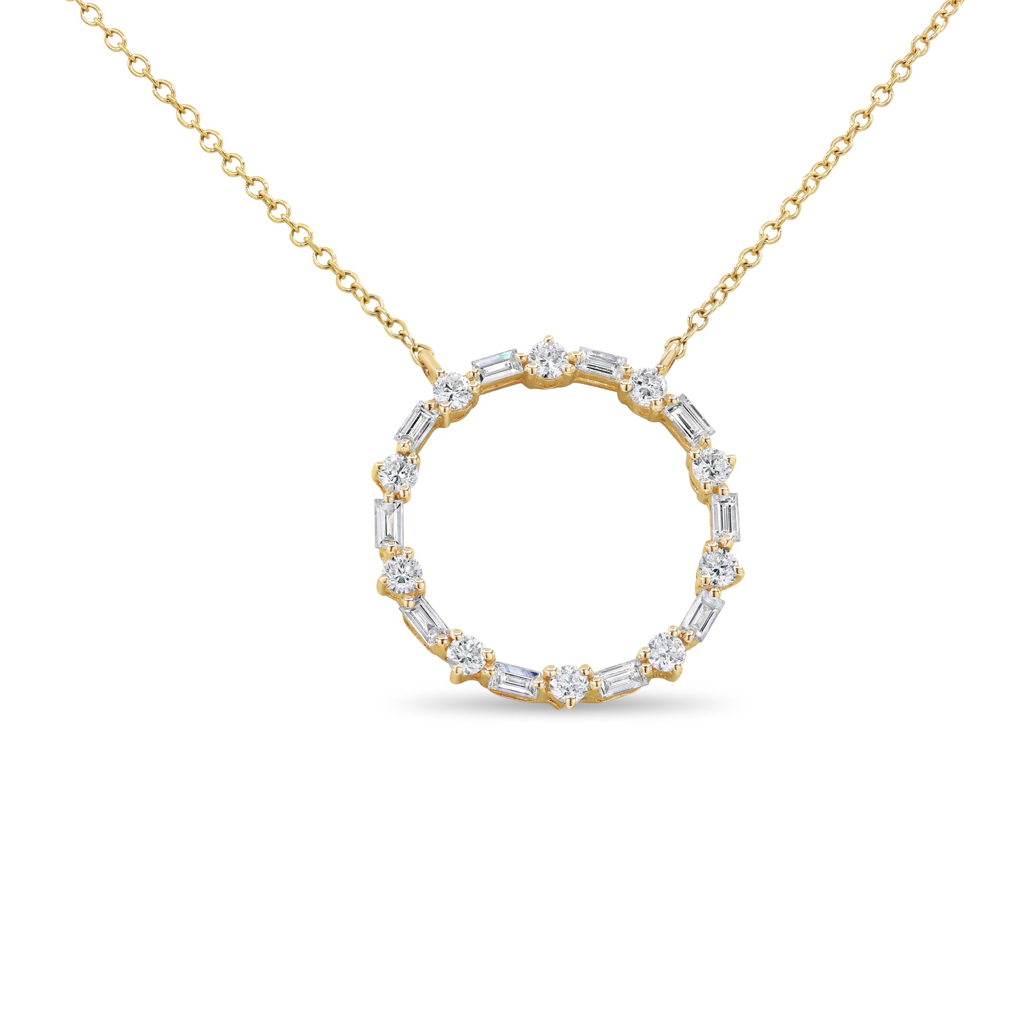 Baguette and round diamond circle pendant in 14K gold featuring alternating diamonds in an open circle design.