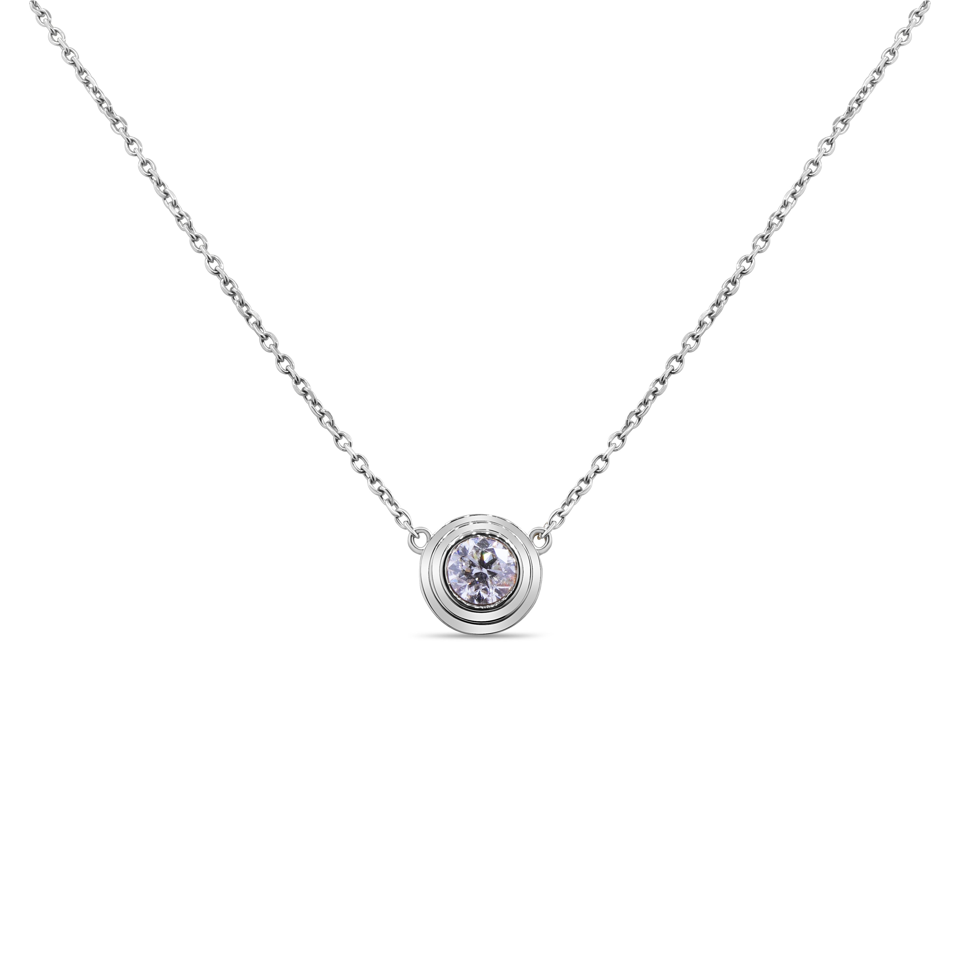 Bezel-set round diamond pendant in 14K gold featuring a natural diamond in a minimal, modern design.