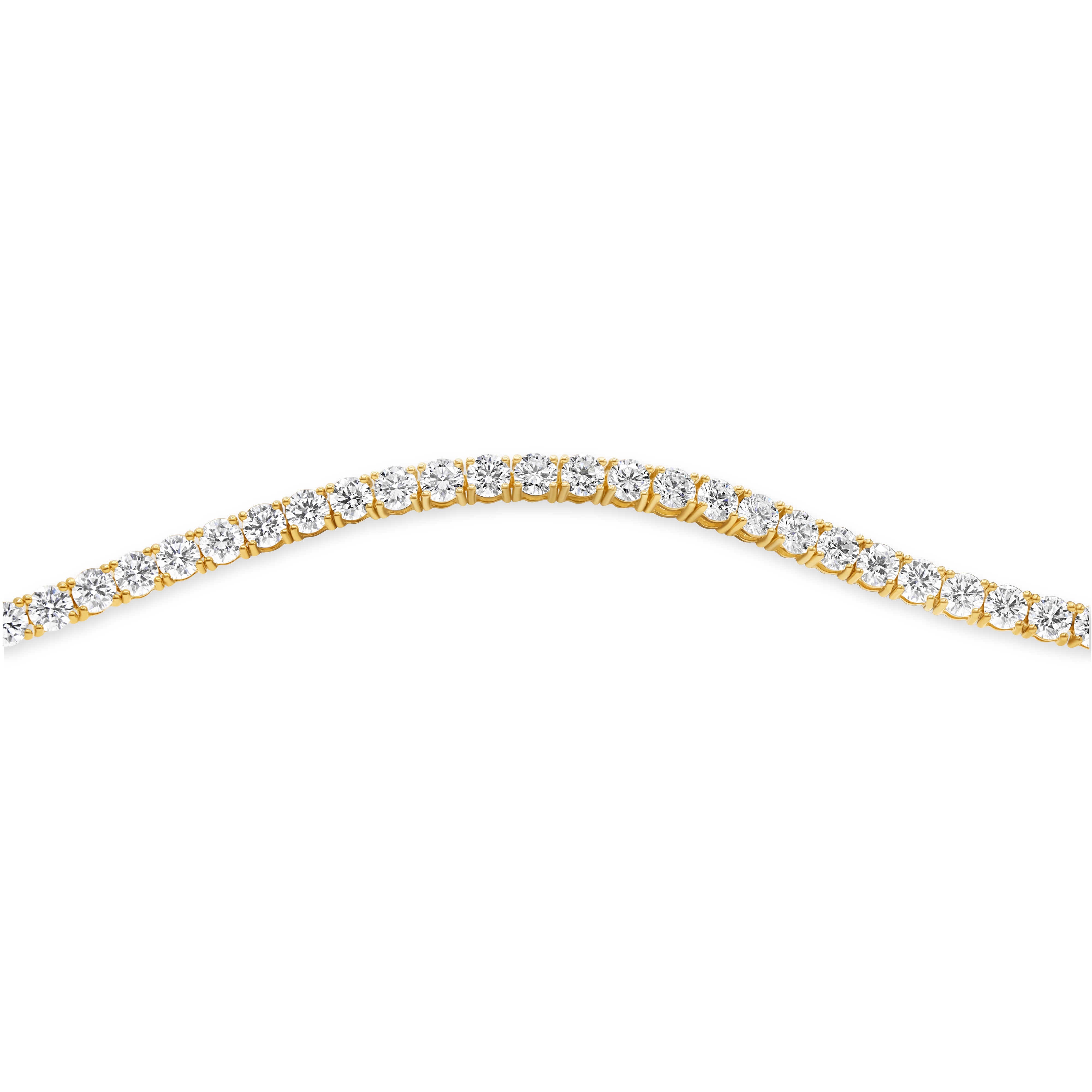 Prong-set round cut diamond tennis bracelet in 14K yellow gold featuring round diamonds in a classic, timeless design.