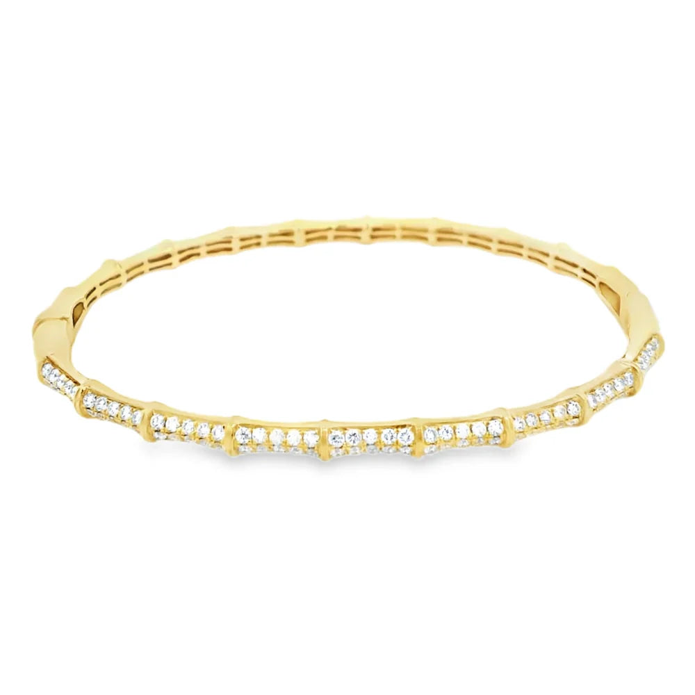 18K gold bamboo bangle featuring round diamonds with G-H color and VS2-SI1 clarity in an elegant nature-inspired design.
