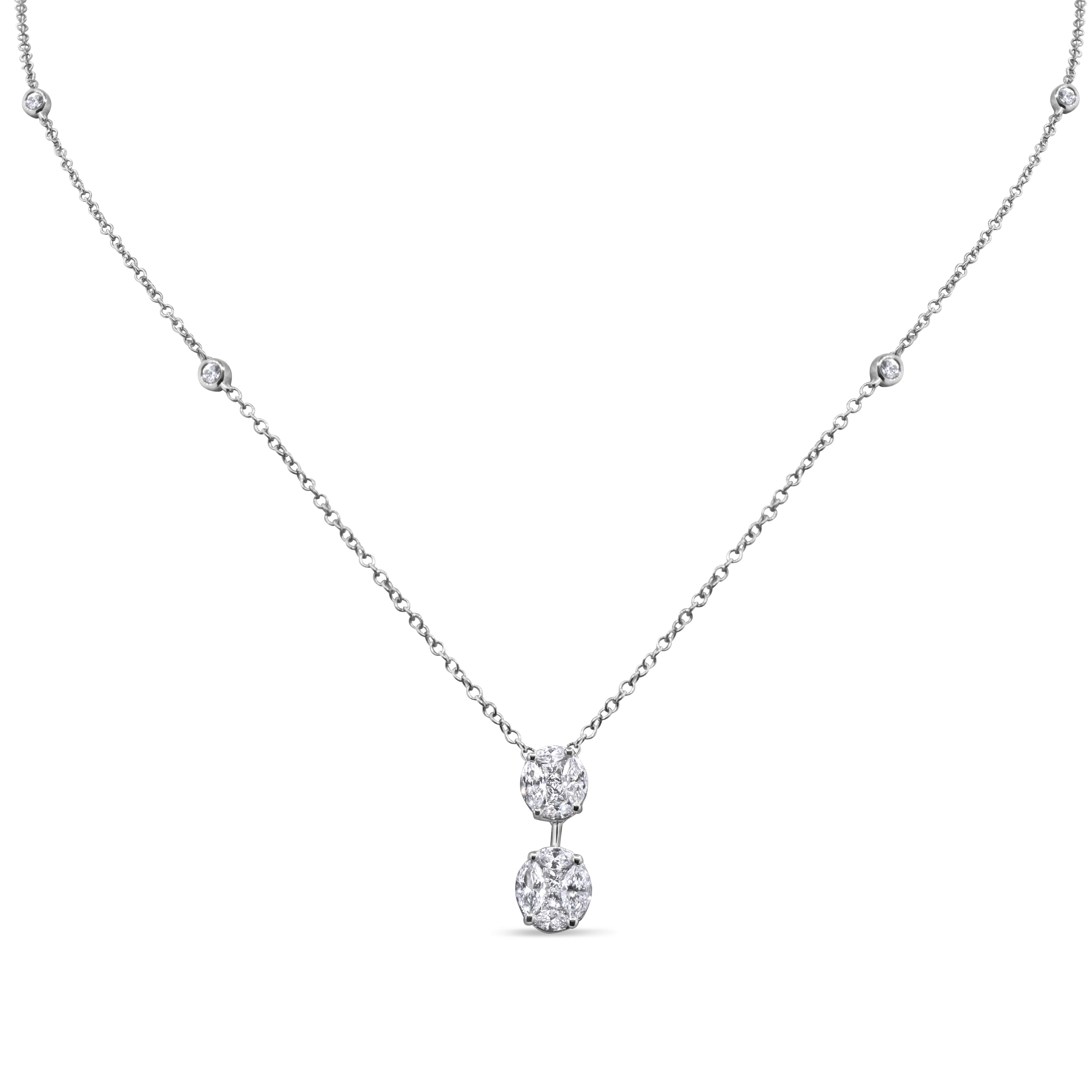14K gold pendant featuring a double oval cluster design with prong-set natural diamonds