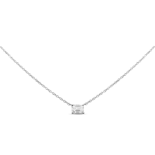 East-west emerald cut diamond pendant in 14K gold featuring a single prong-set diamond in a modern, timeless design.