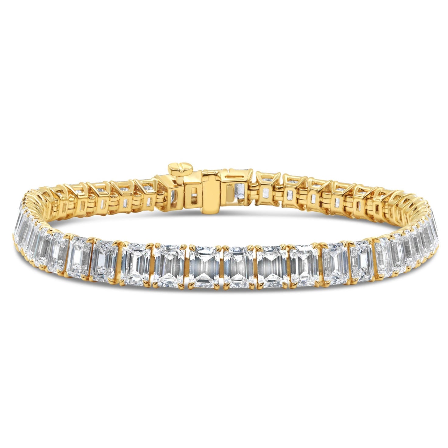 Lab grown emerald cut diamond tennis bracelet in 14K yellow gold featuring emerald cut diamonds in a timeless, elegant design.