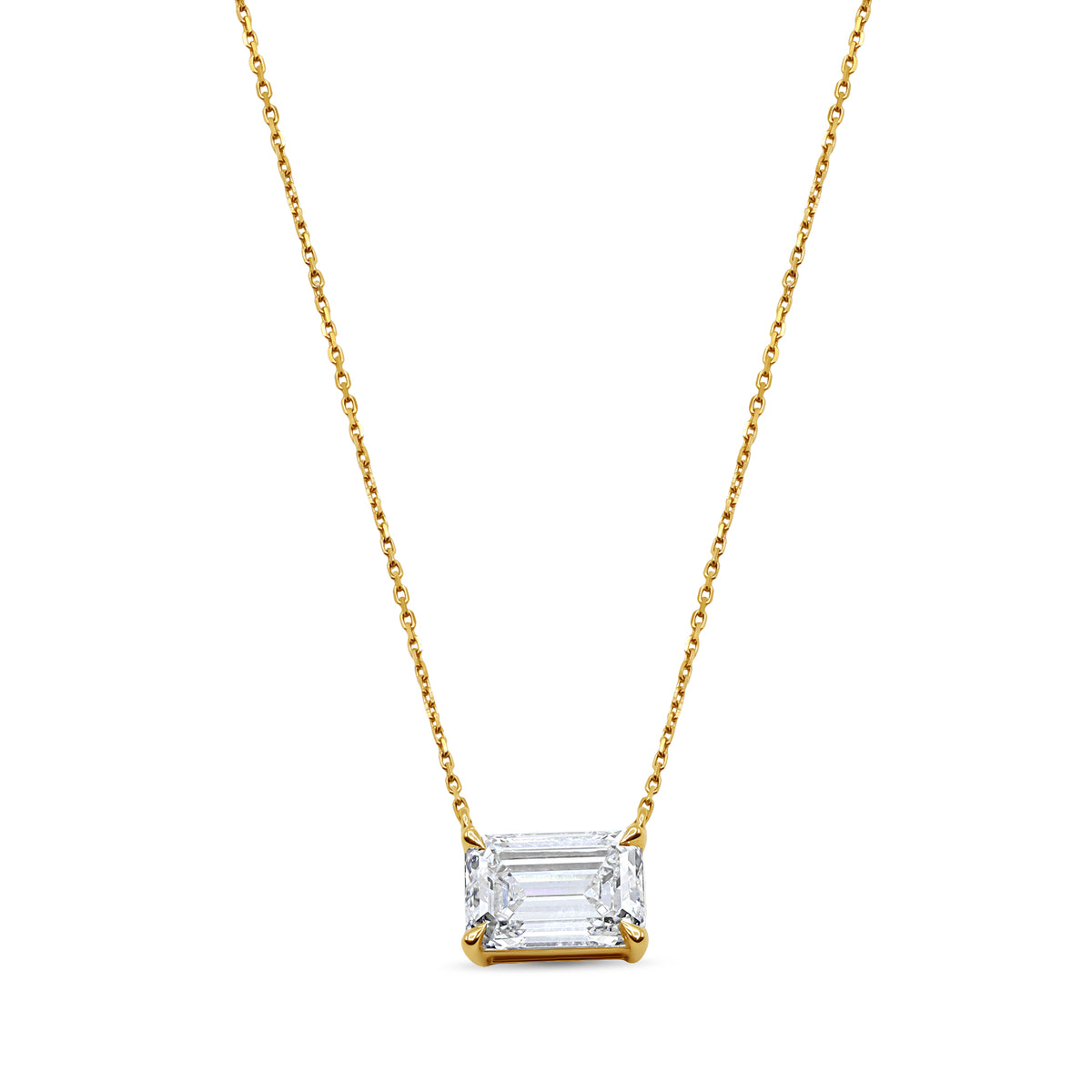 14K yellow gold east-west pendant featuring a 2.01 carat emerald cut F VS1 diamond.