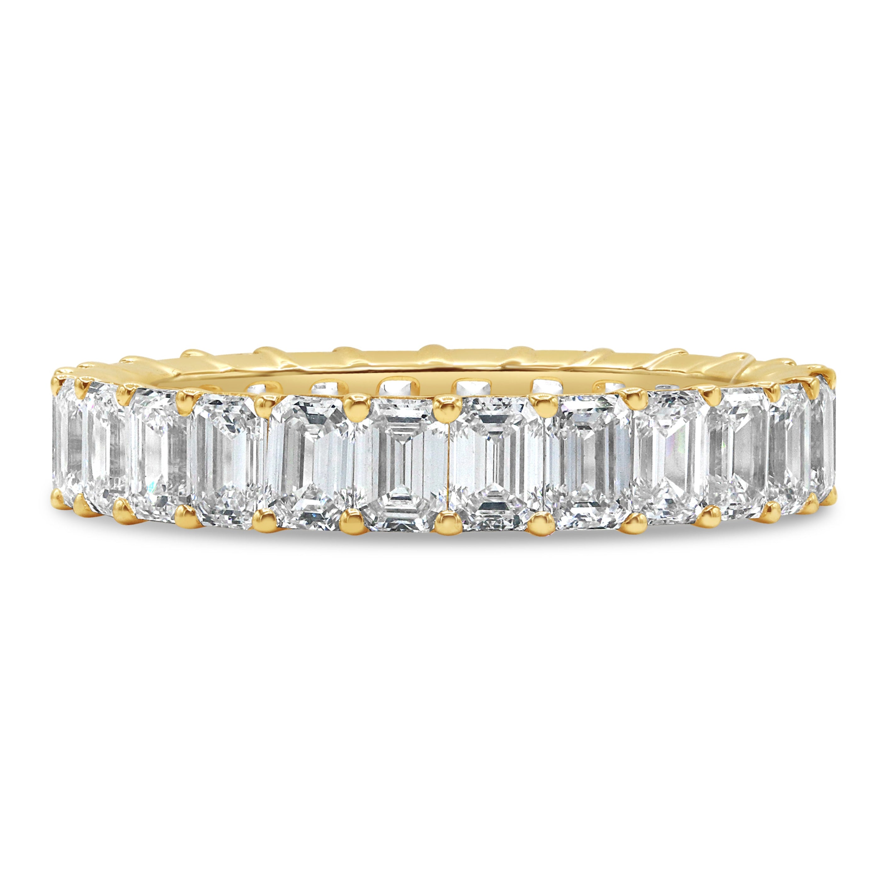 Lab grown emerald cut diamond eternity band in 14K yellow gold featuring emerald cut diamonds in a classic full eternity design.