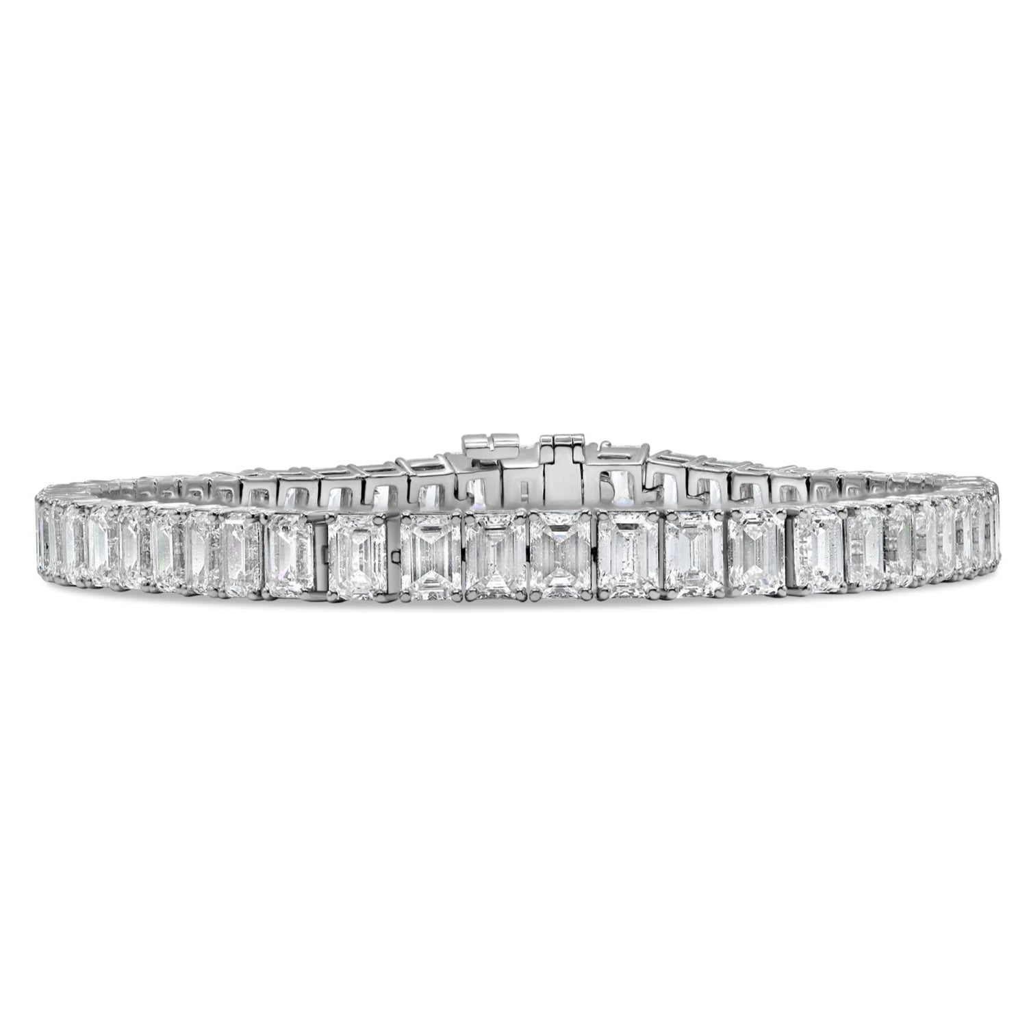 Lab grown emerald cut diamond tennis bracelet in 14K white gold featuring emerald cut diamonds in a timeless, elegant design.