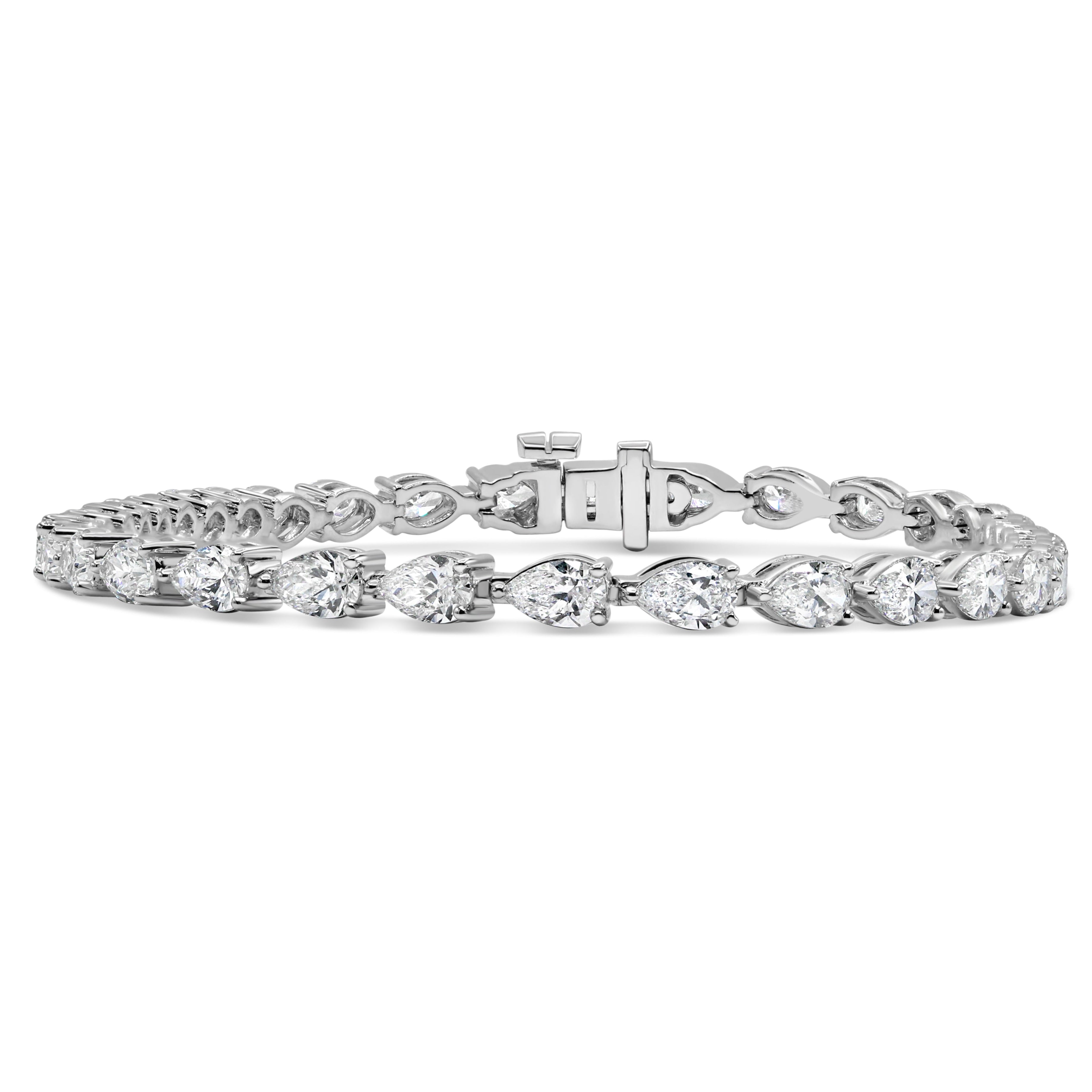 Lab grown pear cut diamond tennis bracelet in 14K white gold featuring pear cut diamonds in a classic, elegant design.