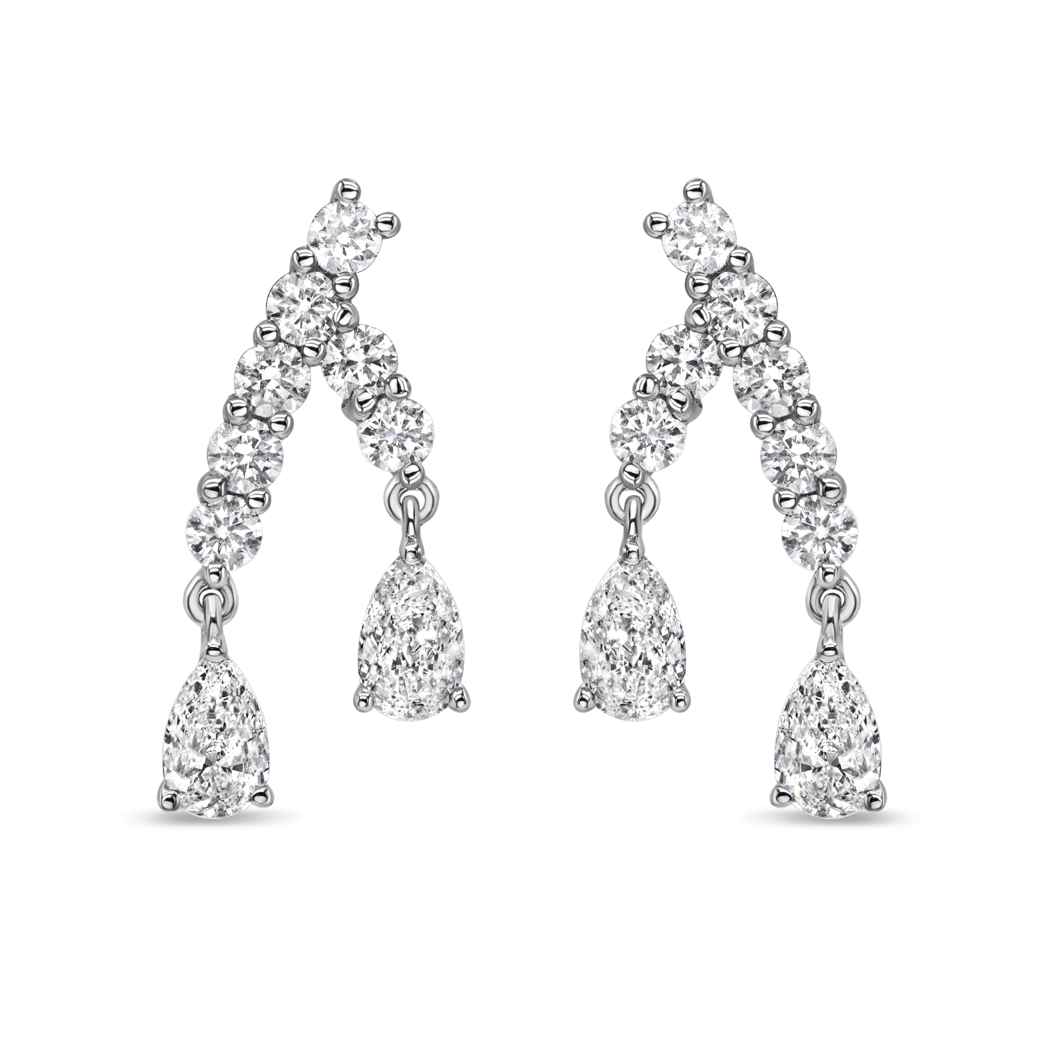 18K white gold drop earrings featuring side-by-side pear-shaped diamonds with graduated round brilliant diamond accents.