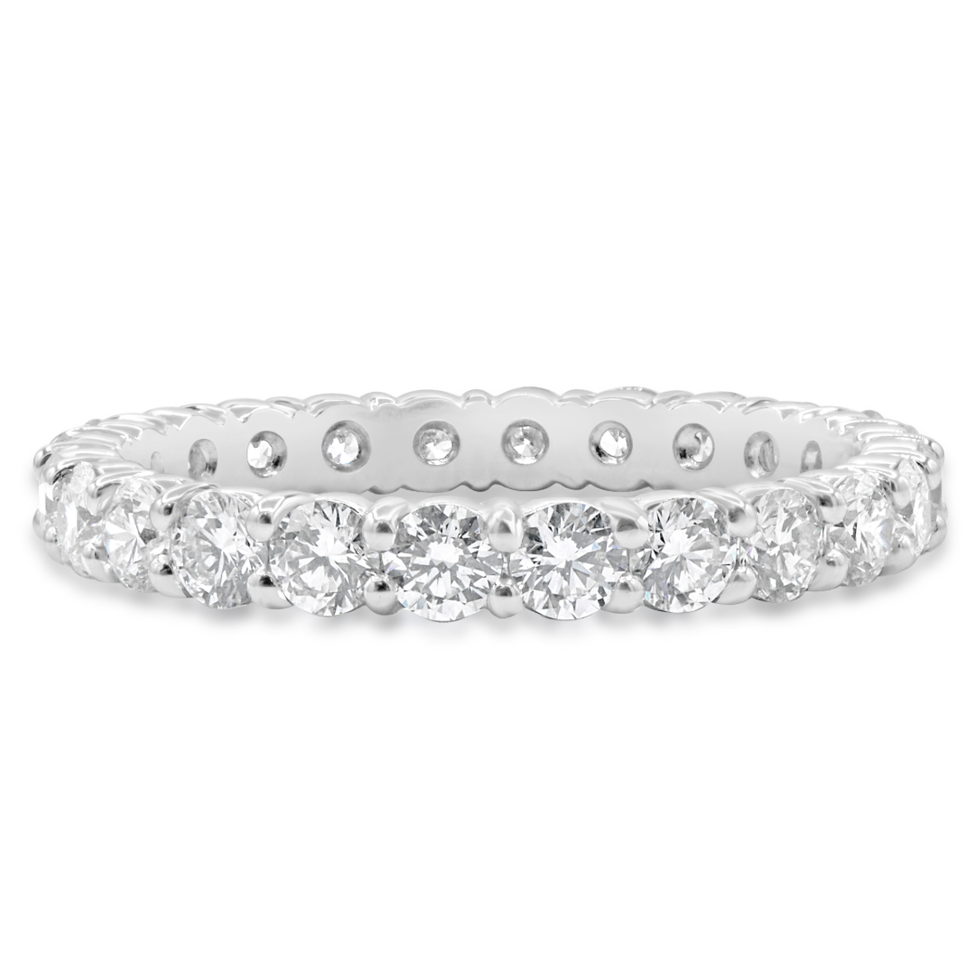 Platinum 5 pointer eternity band featuring 24 brilliant round diamonds totaling 1.19 CTW.