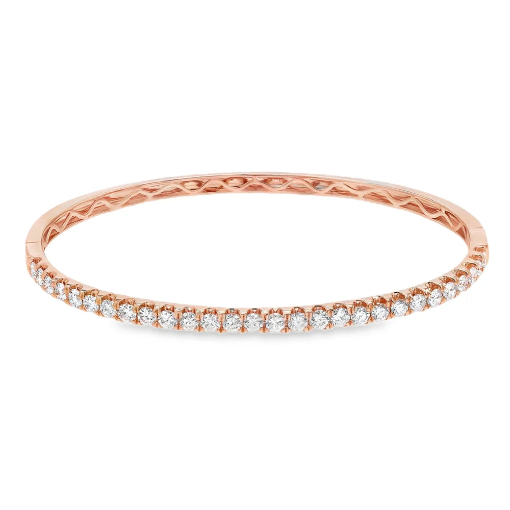 Elegant diamond bangle available in yellow, white, or rose gold with approximately 1.00 to 3.00 carats of diamonds.